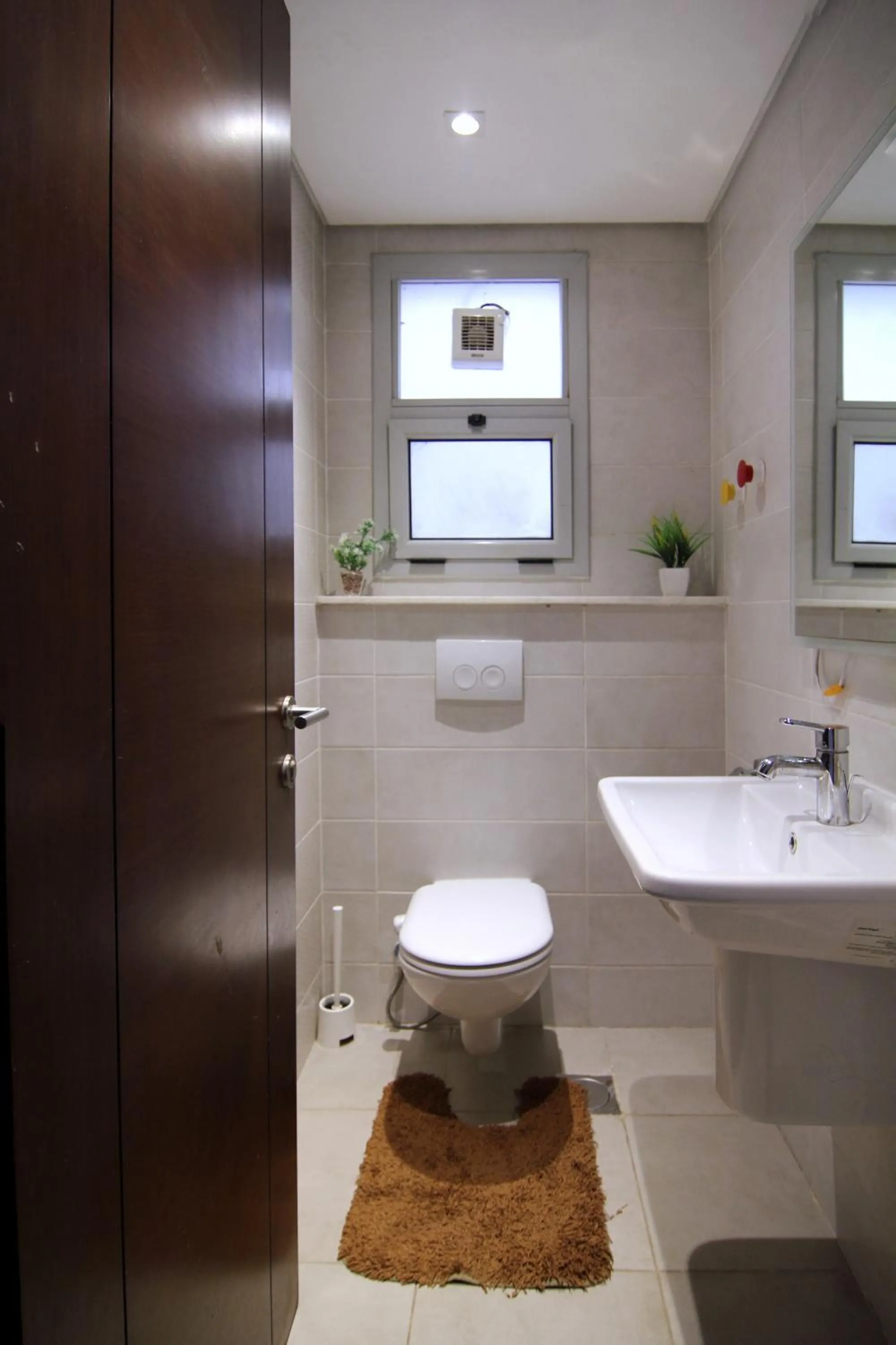 Toilet in Axxodia- Apartments In Cairo Festival City