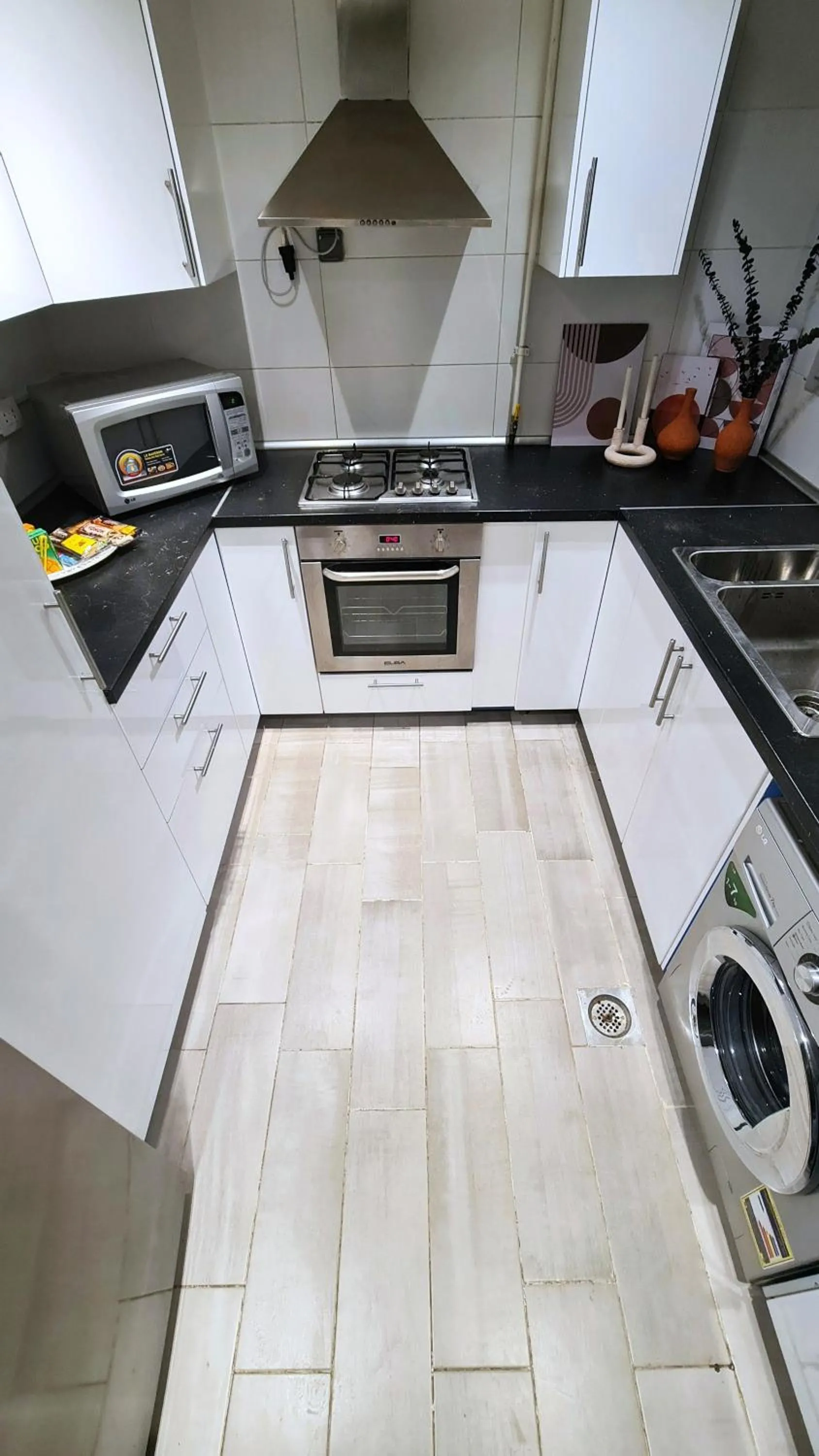 kitchen in Axxodia- Apartments In Cairo Festival City