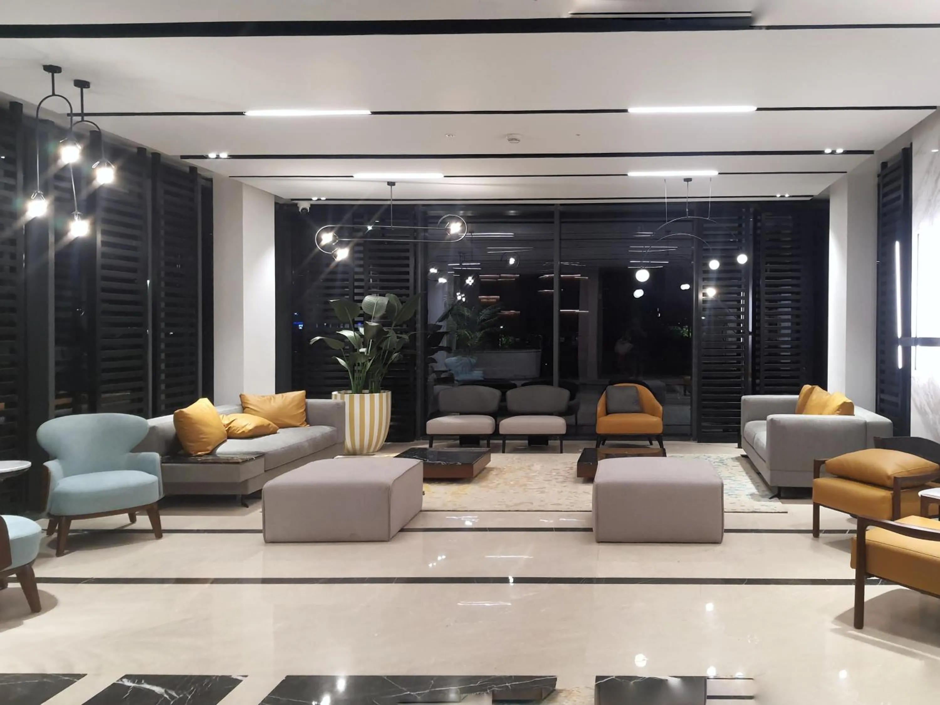 Lobby or reception in Axxodia- Apartments In Cairo Festival City