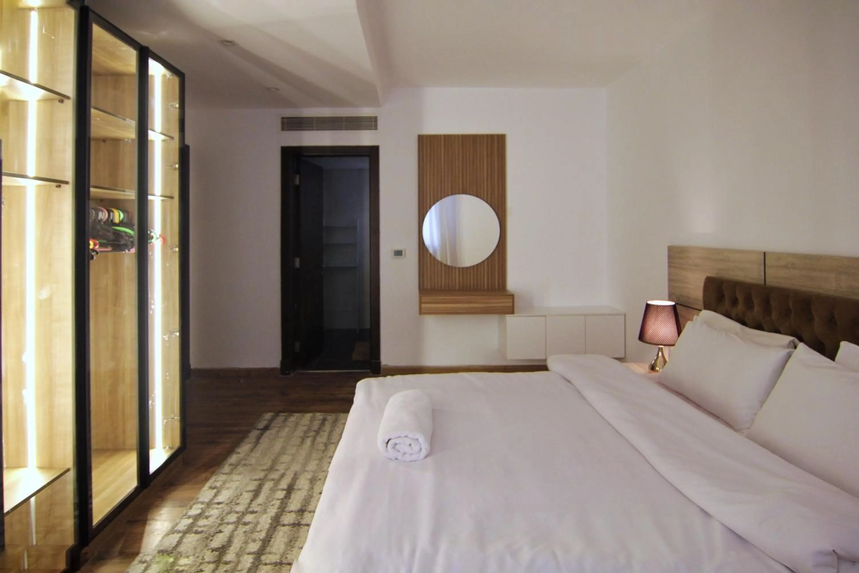 Bedroom, Bed in Axxodia- Apartments In Cairo Festival City