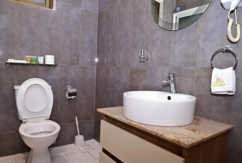 Toilet in Hylise Hotel