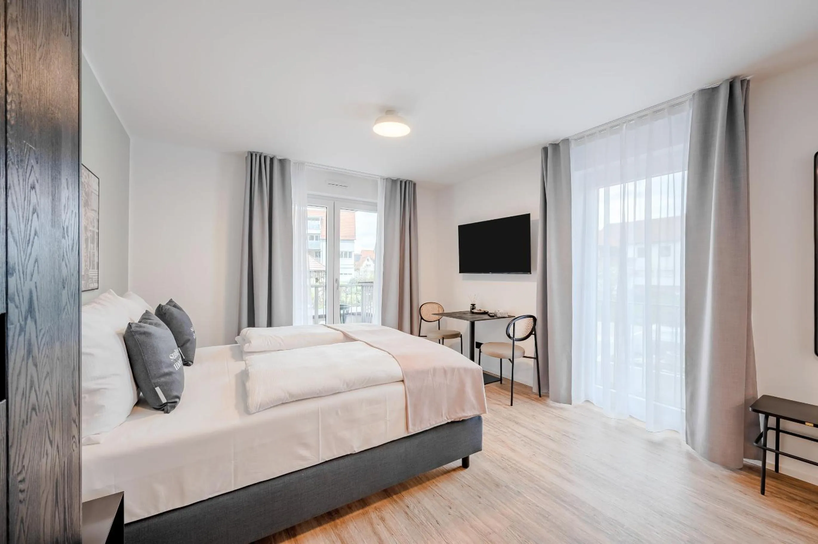 TV and multimedia, Bed in Limehome Metzingen Wilhelmstr