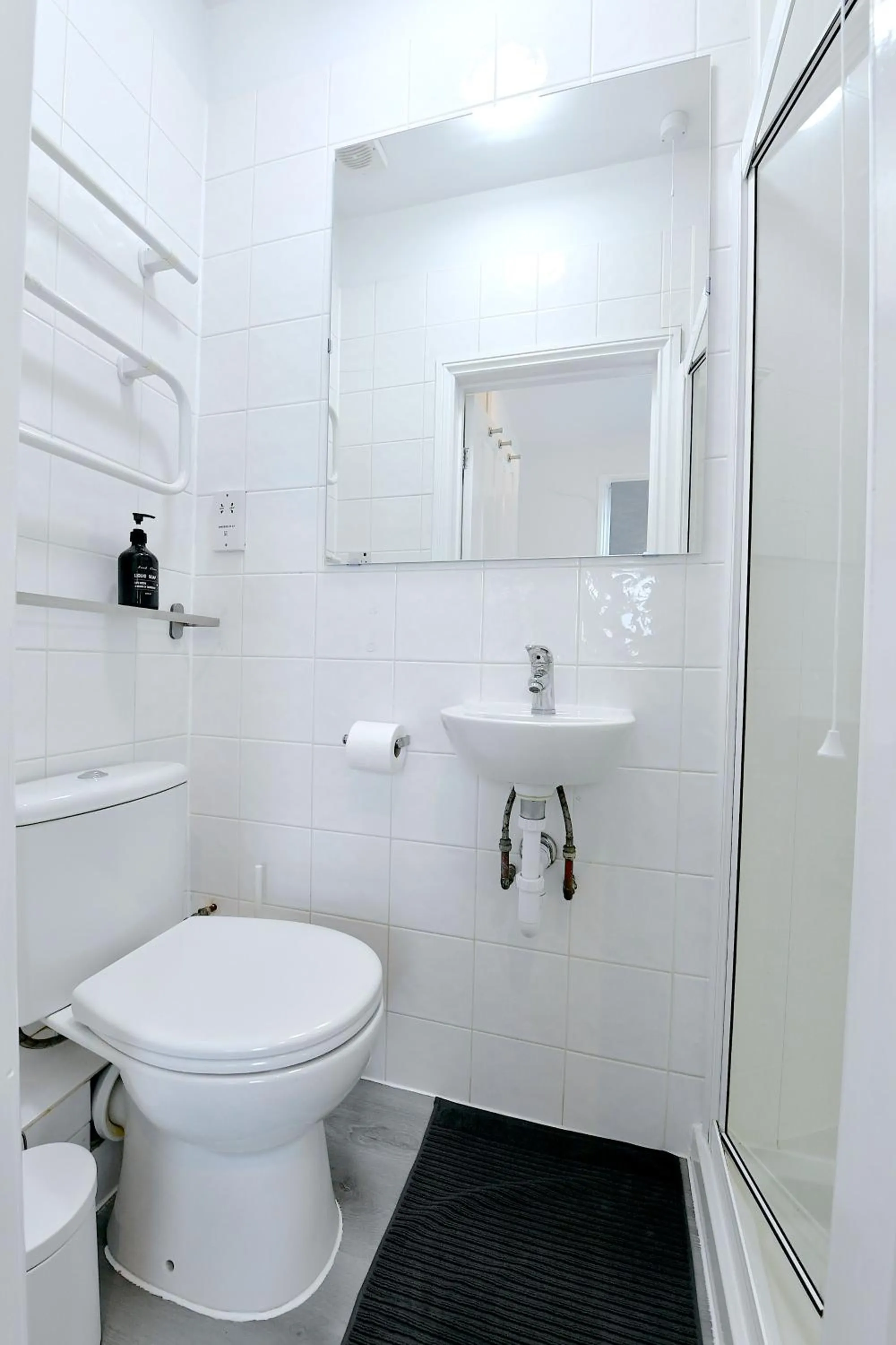 Shower in Stylish Studios by Luxestays Fulham