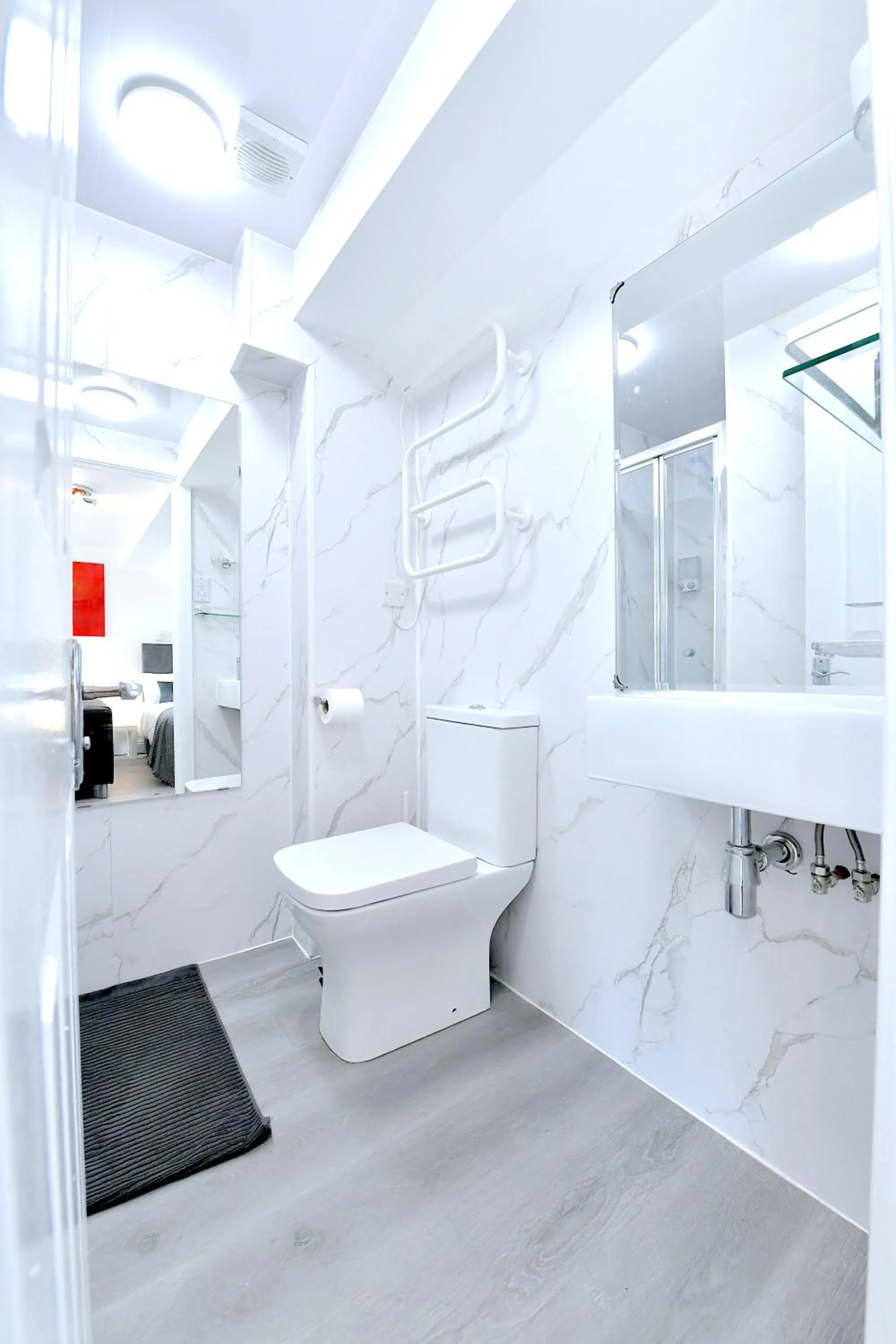 Toilet in Stylish Studios by Luxestays Fulham