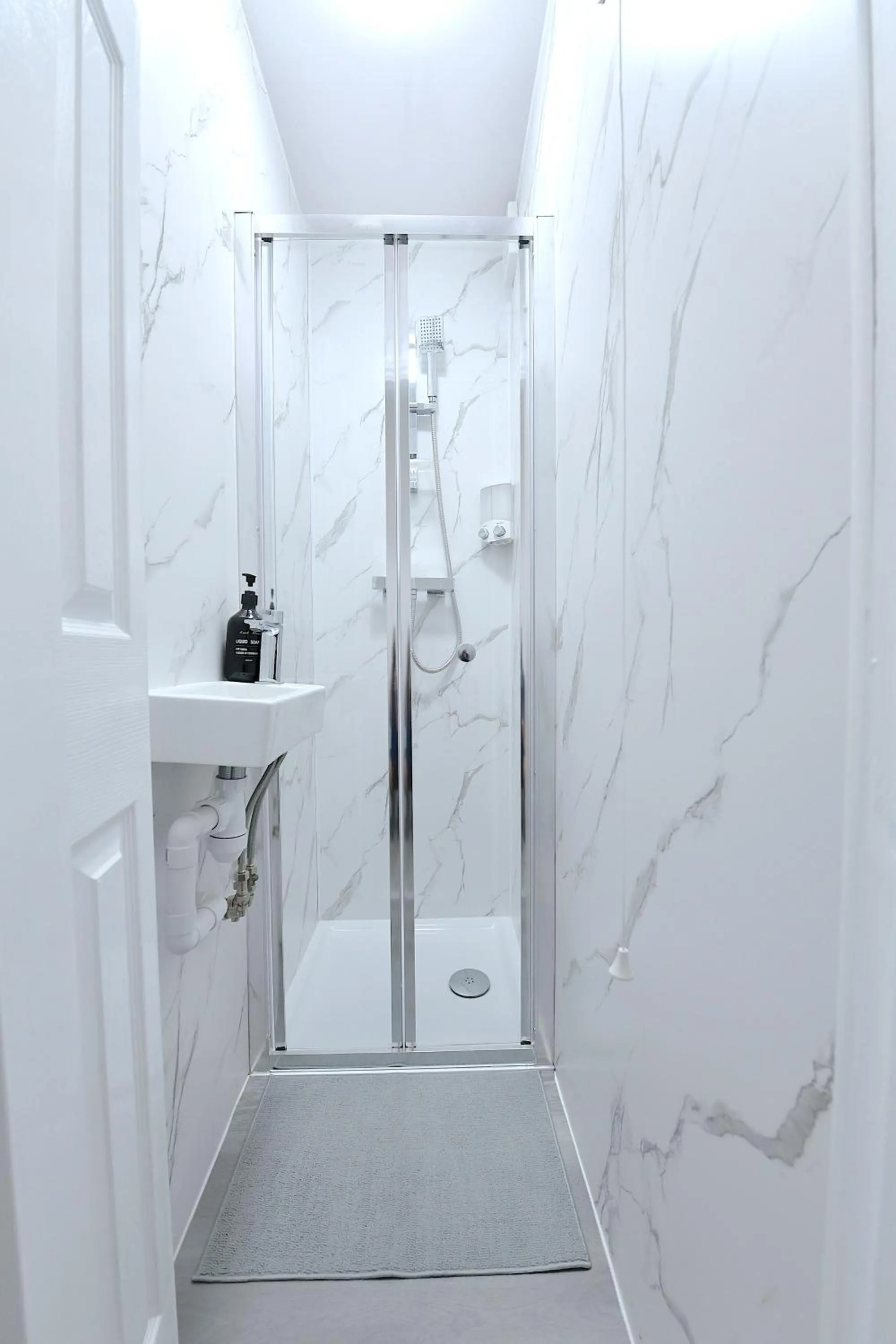 Shower in Stylish Studios by Luxestays Fulham