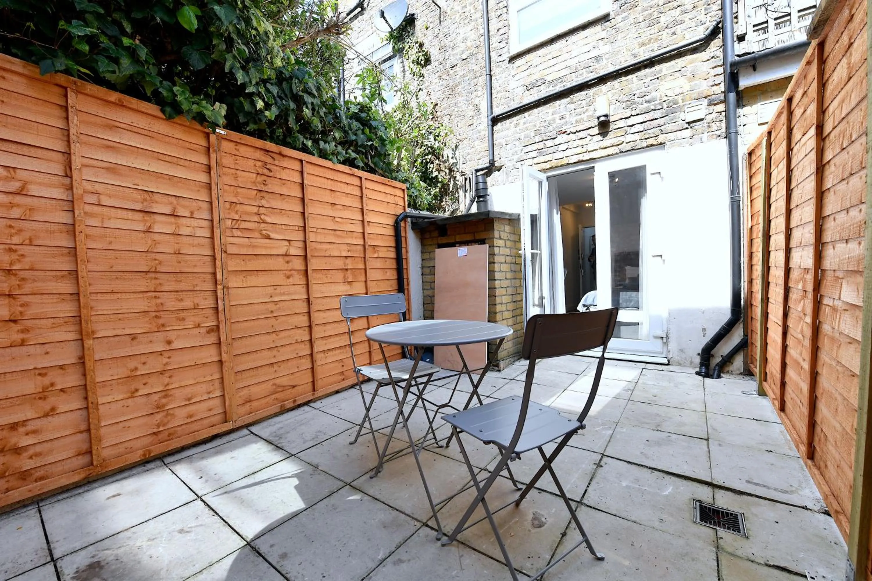 Patio in Stylish Studios by Luxestays Fulham