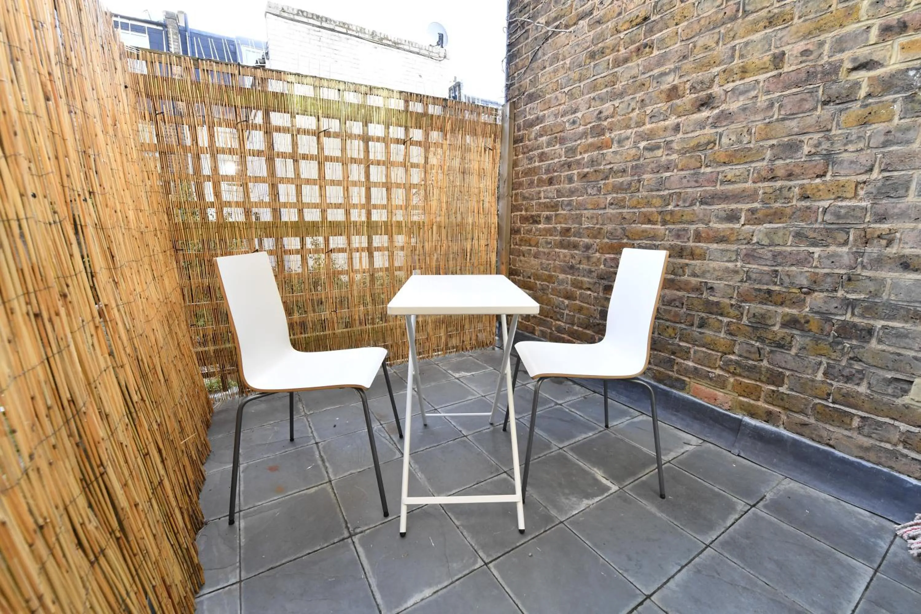 Patio in Stylish Studios by Luxestays Fulham