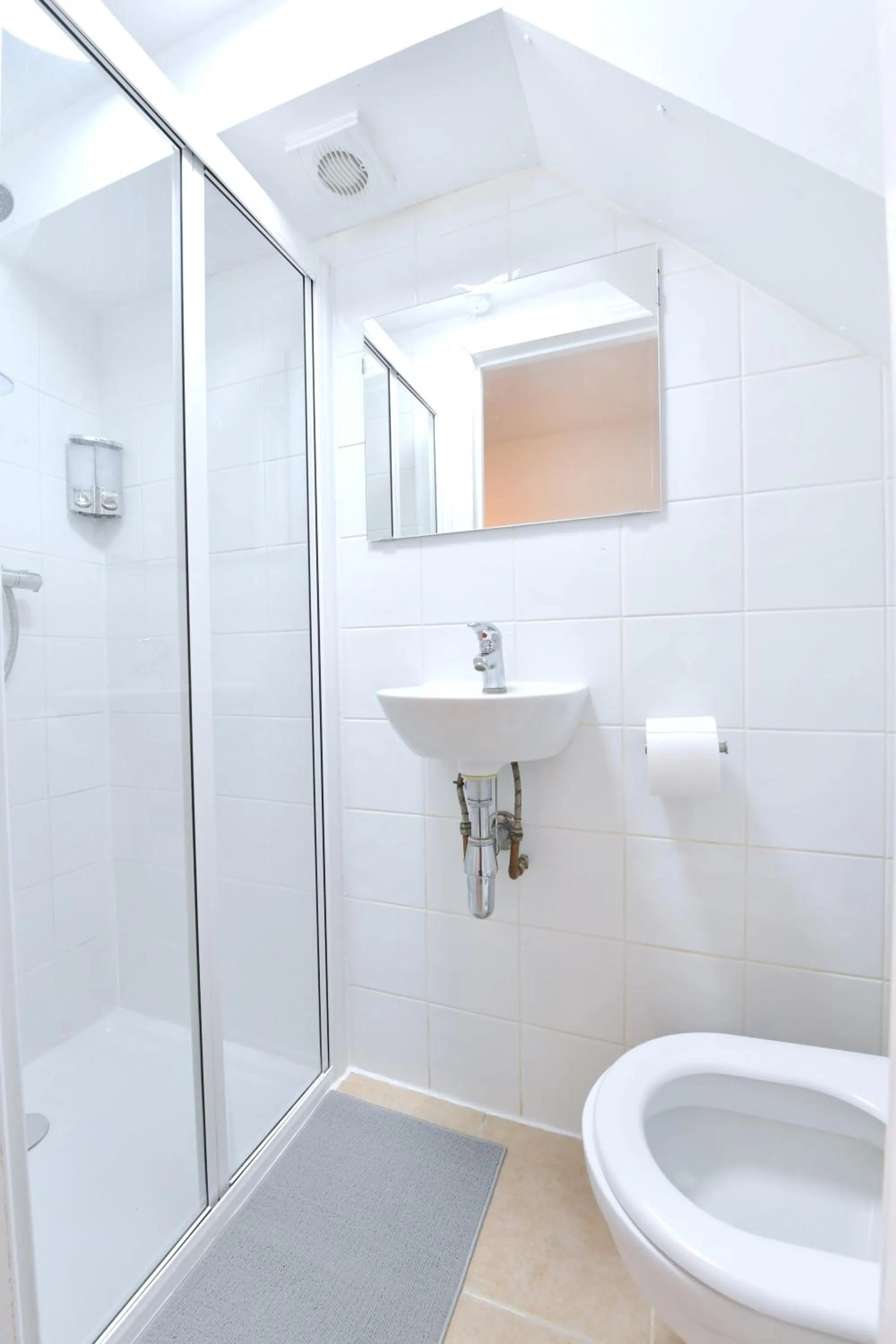Shower in Stylish Studios by Luxestays Fulham
