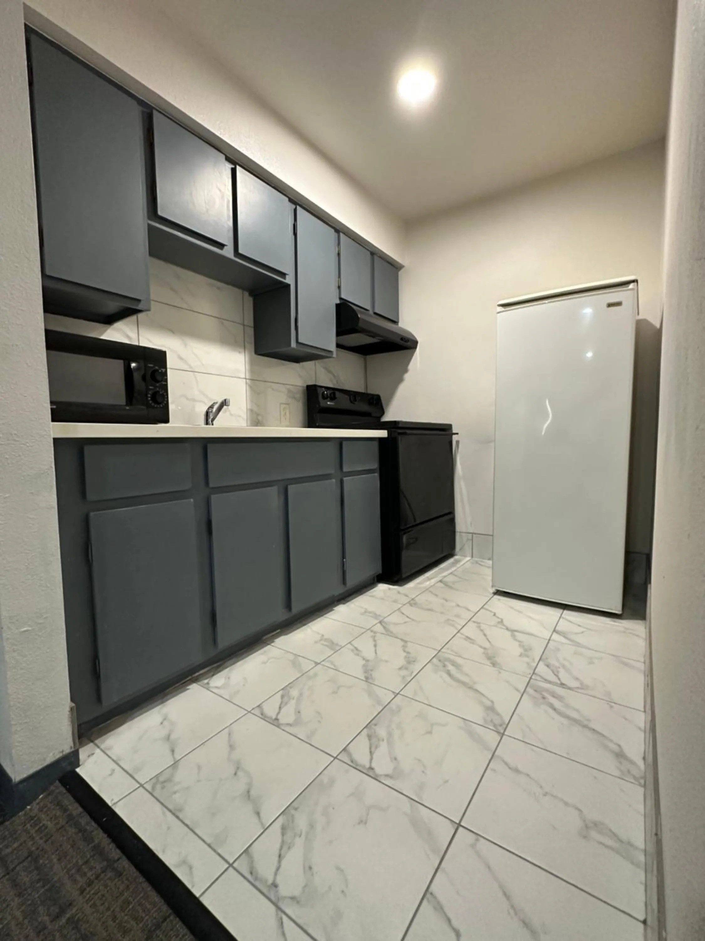 Kitchen or kitchenette in Llano Motel