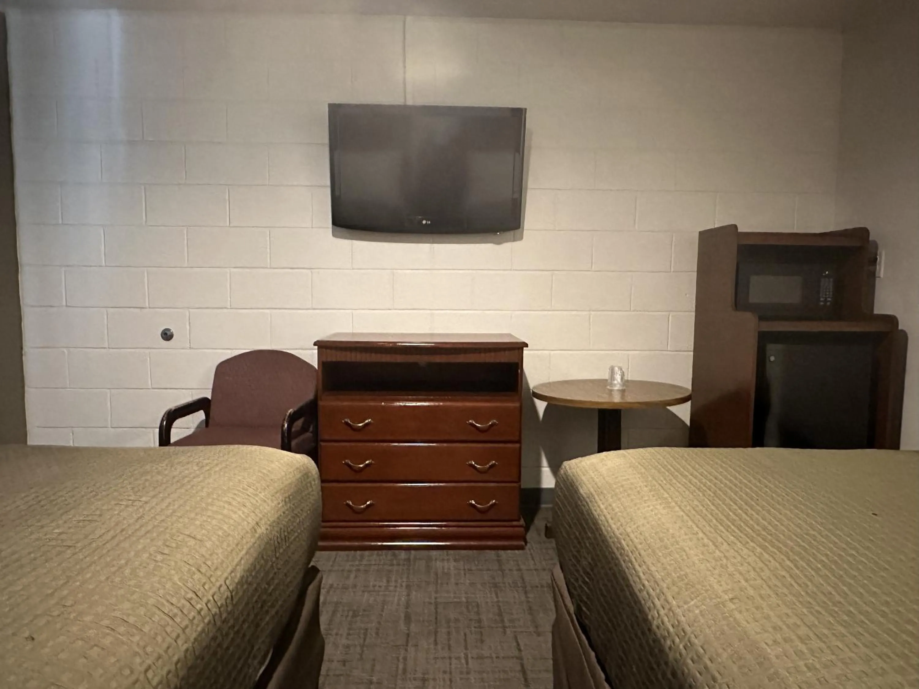Living room, Bed in Llano Motel