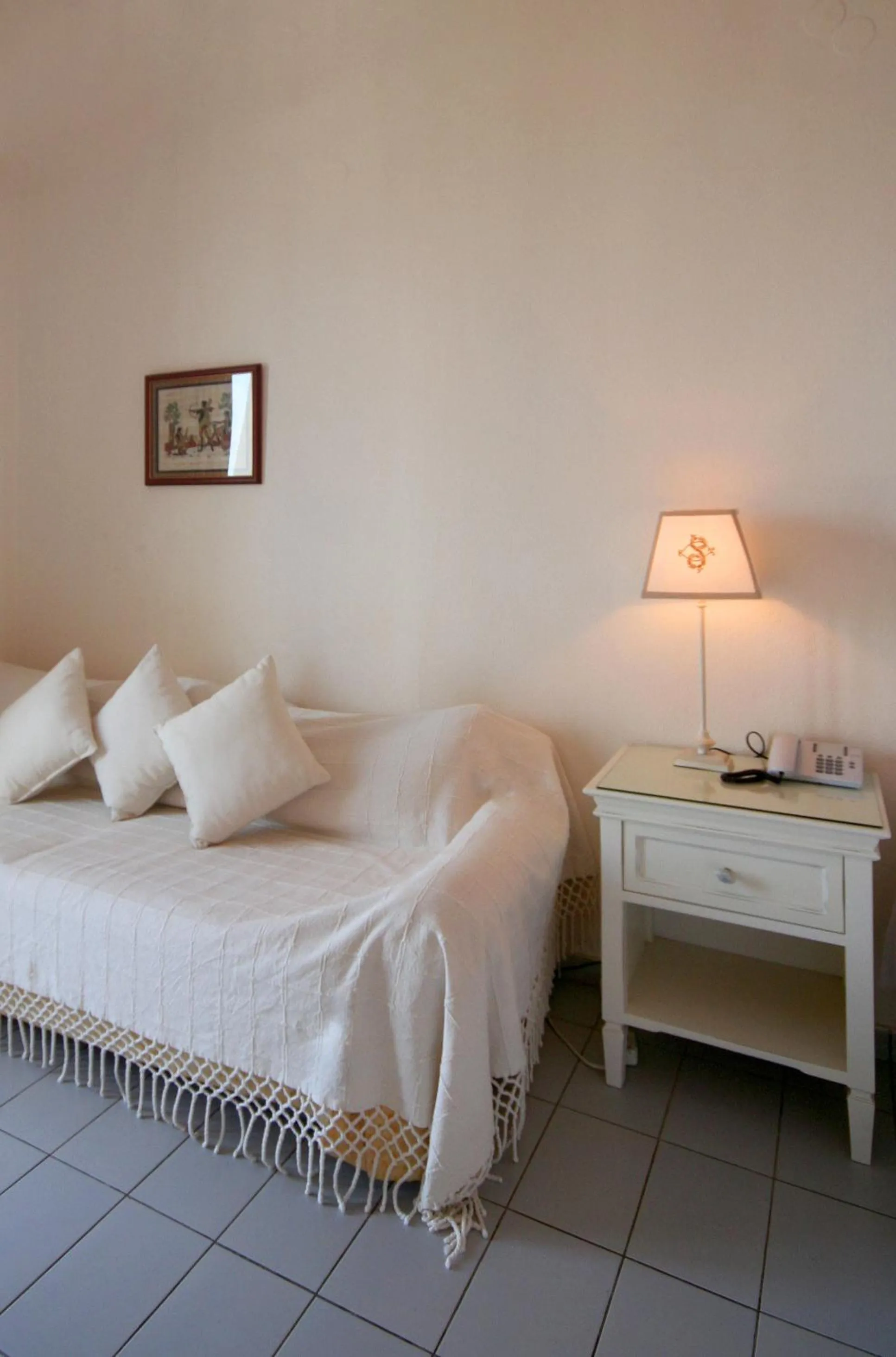 Seating area, Bed in Clara Resort