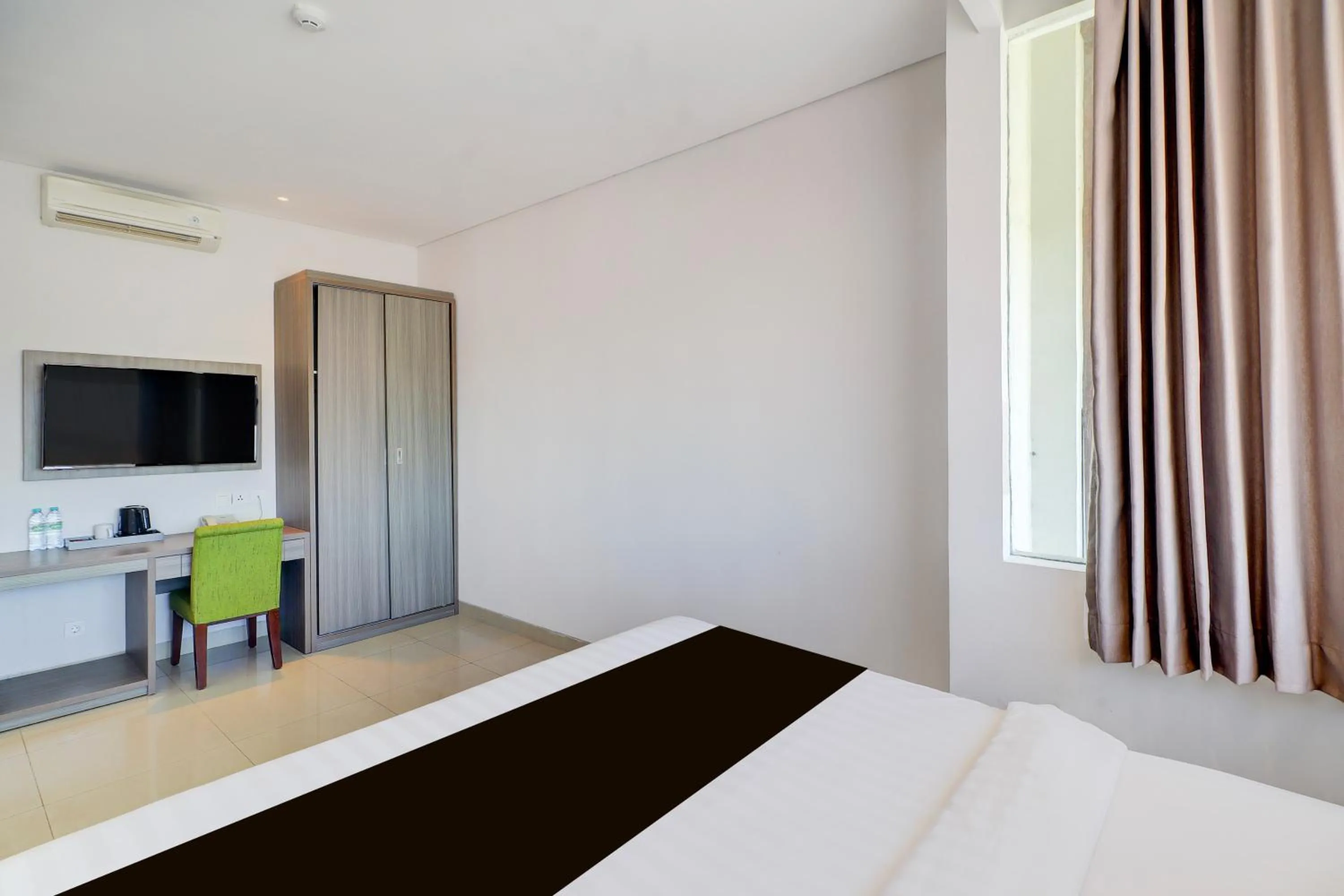 Bed in Palette Signature Hotel