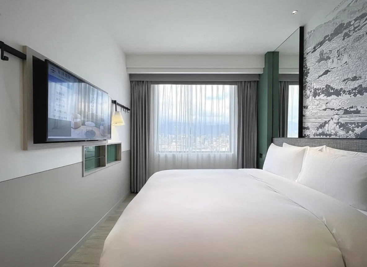 Bed in Boutech JianTan Hotel