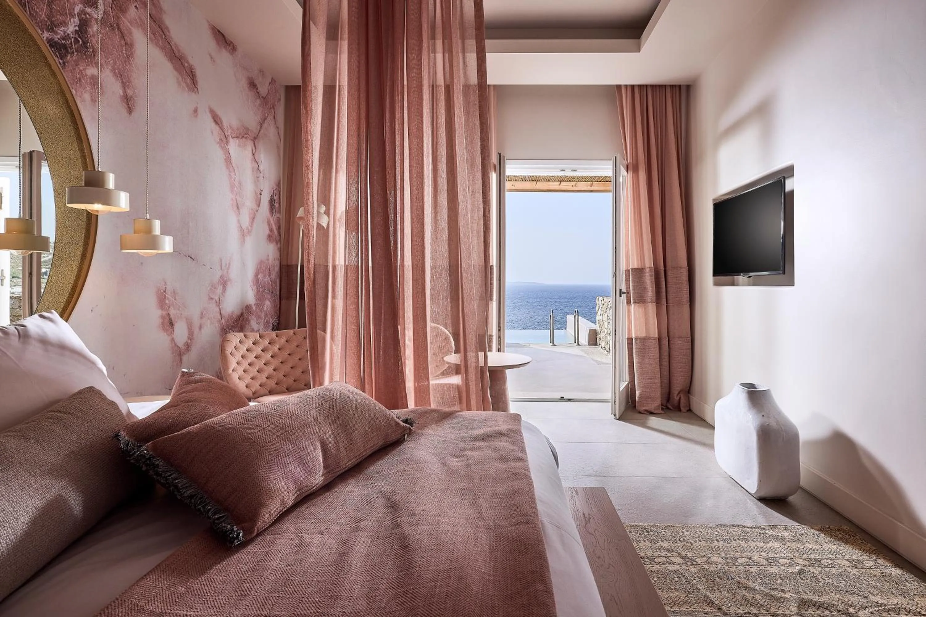 Bed in Amazon Mykonos Suites & Spa