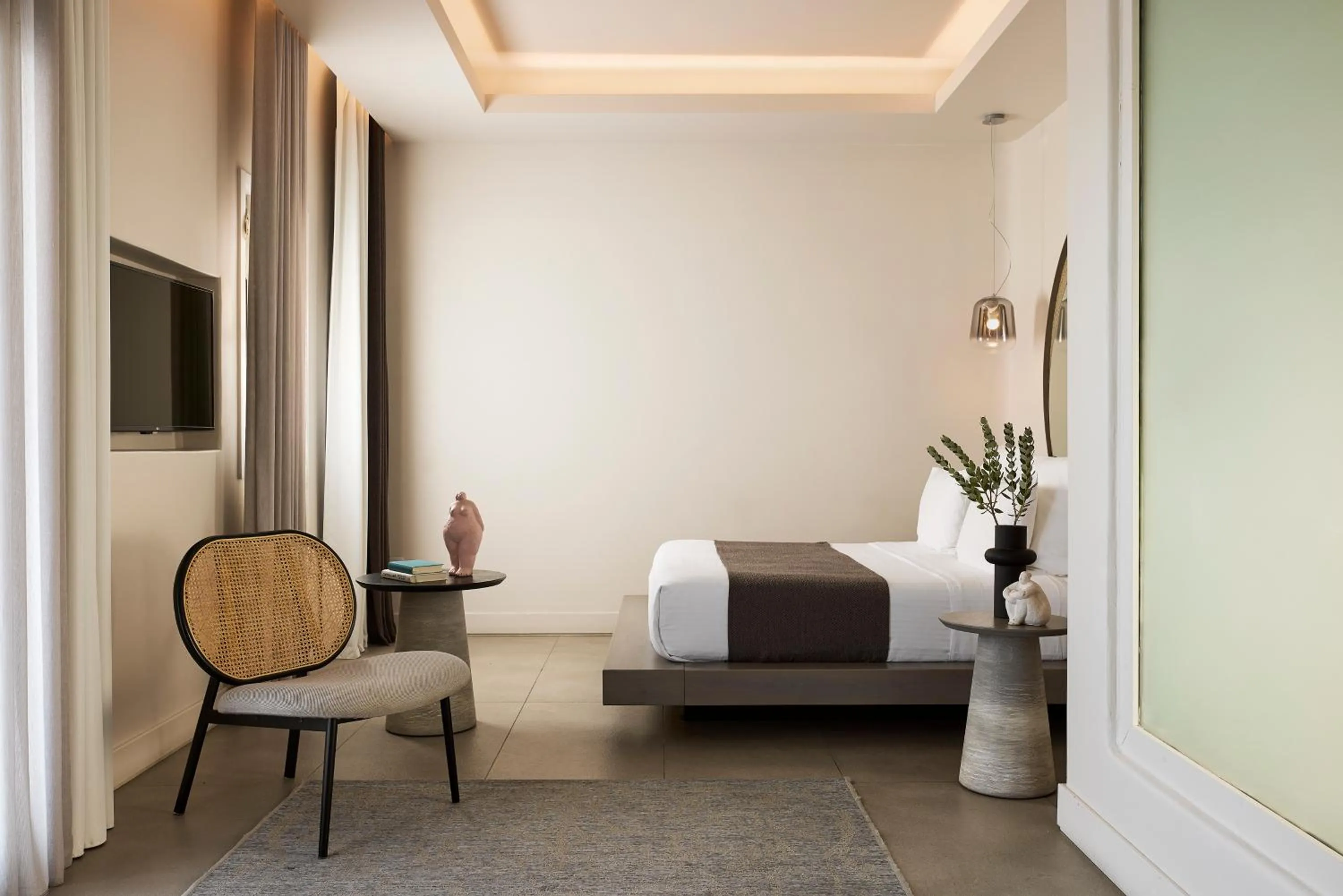 Bed in Amazon Mykonos Suites & Spa