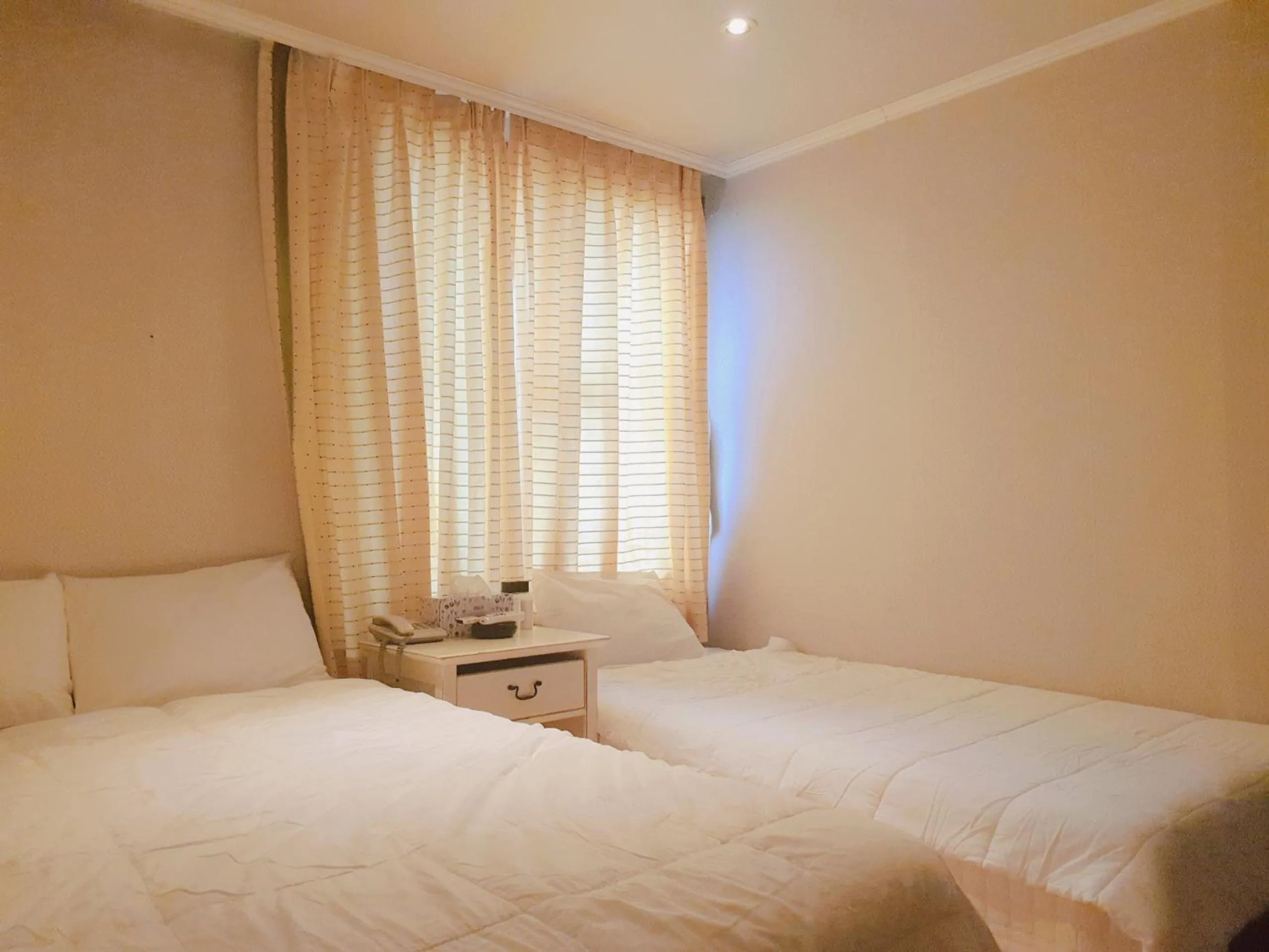 Bed in Hotel Good Inn