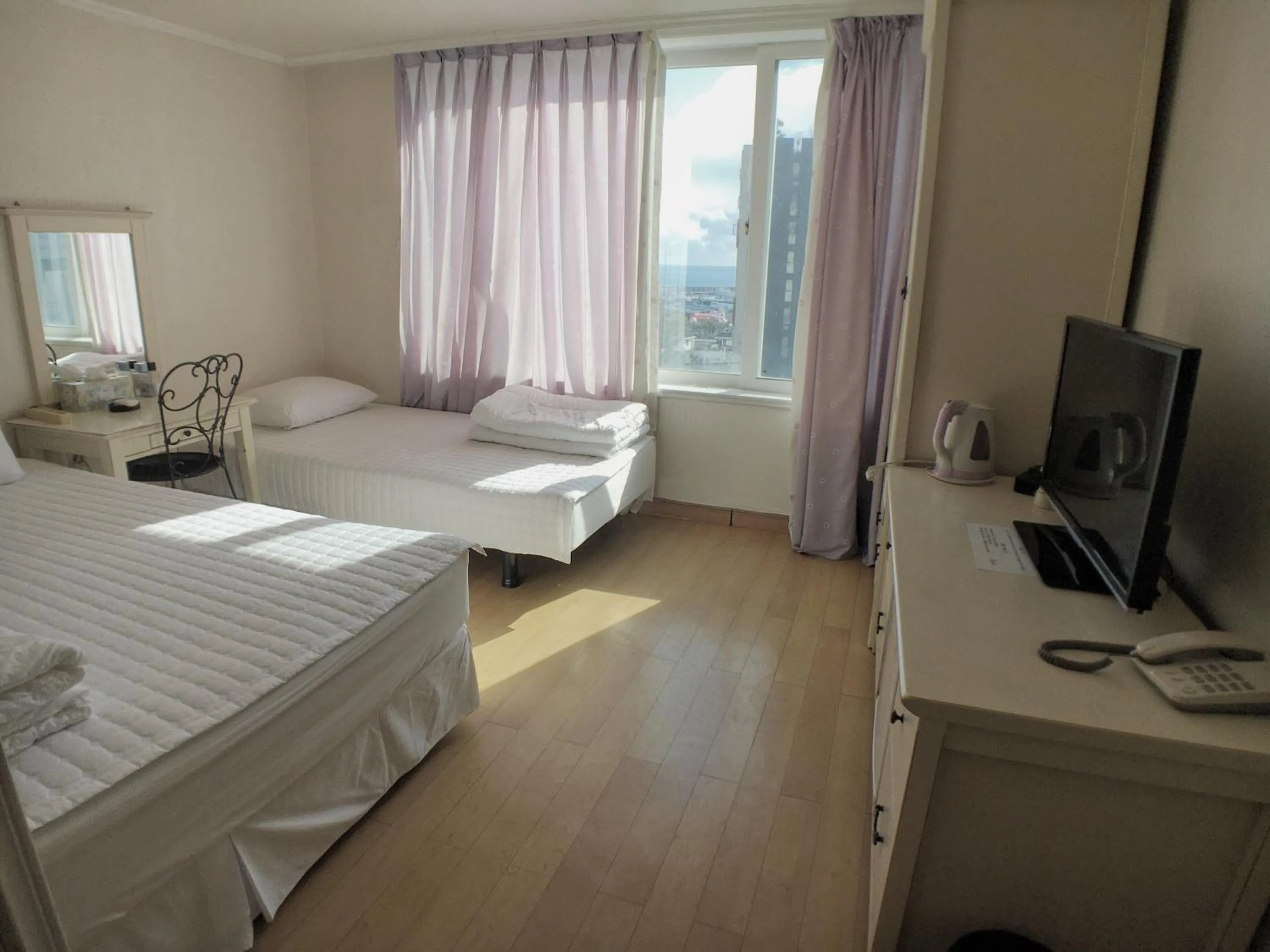 Bed in Hotel Good Inn