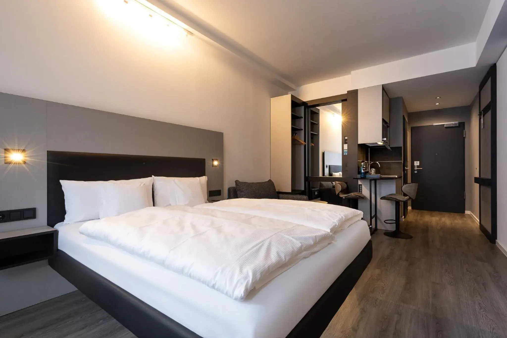 Photo of the whole room, Bed in GINN Apartment-Hotel Stuttgart-Esslingen Photo of the whole room, Bed in GINN Apartment-Hotel Stuttgart-Esslingen