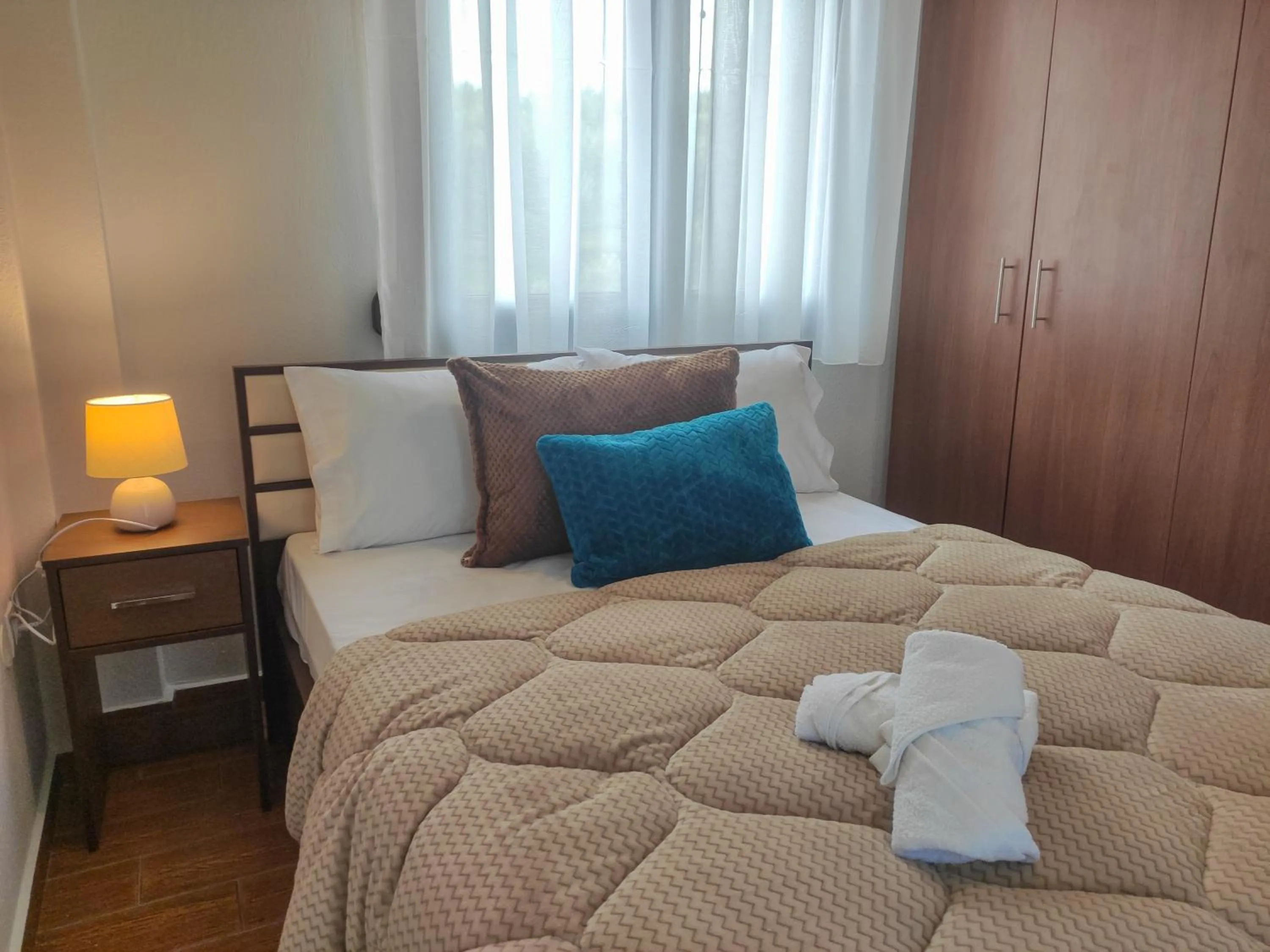 Bed in Kashmir Luxury Apartments