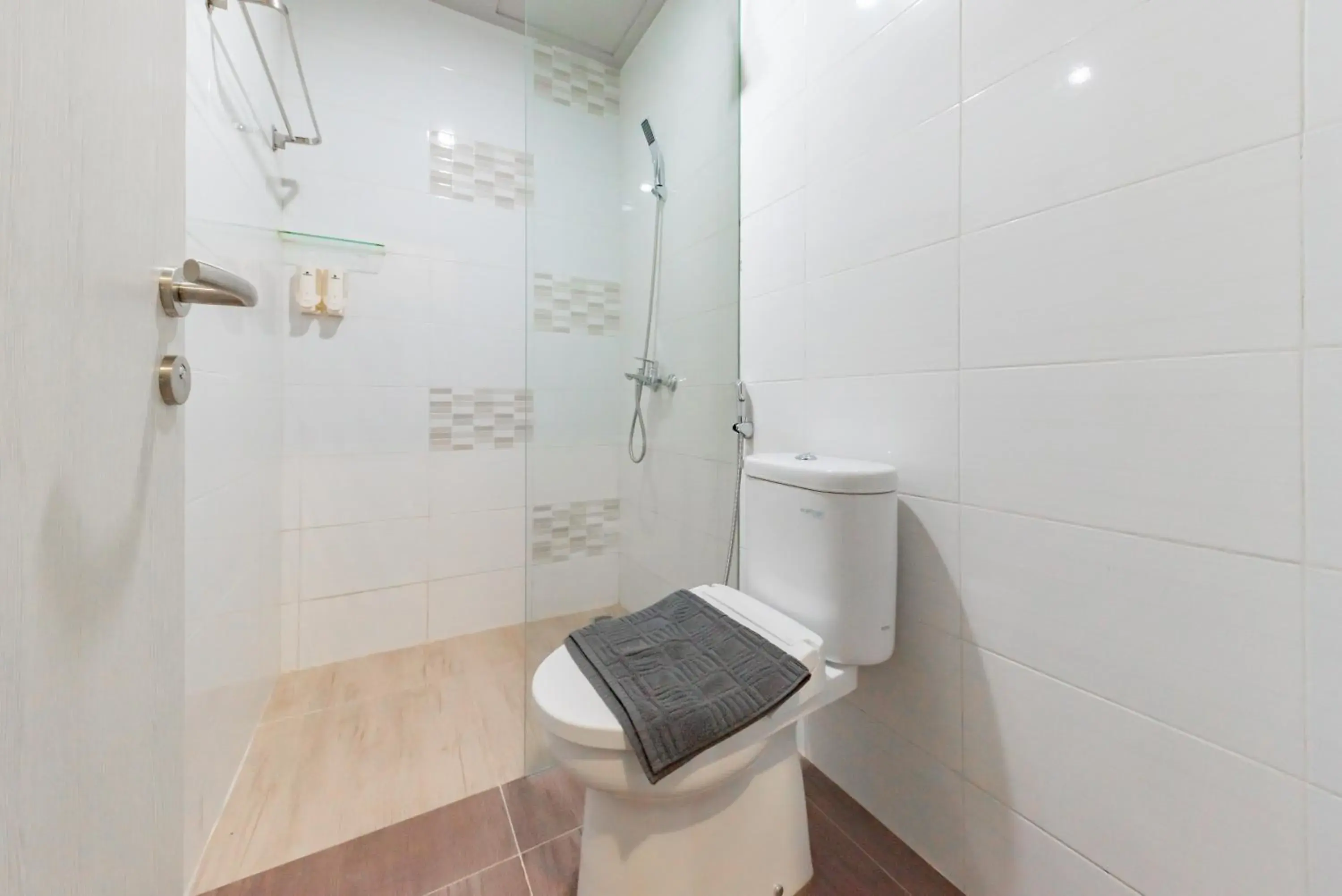 Bathroom in Sans Hotel Berau Square Bathroom in Sans Hotel Berau Square