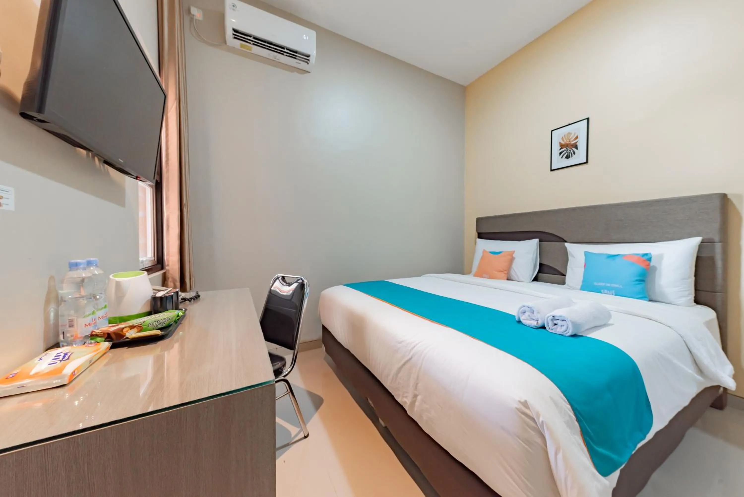 Bedroom, Bed in Sans Hotel Berau Square
