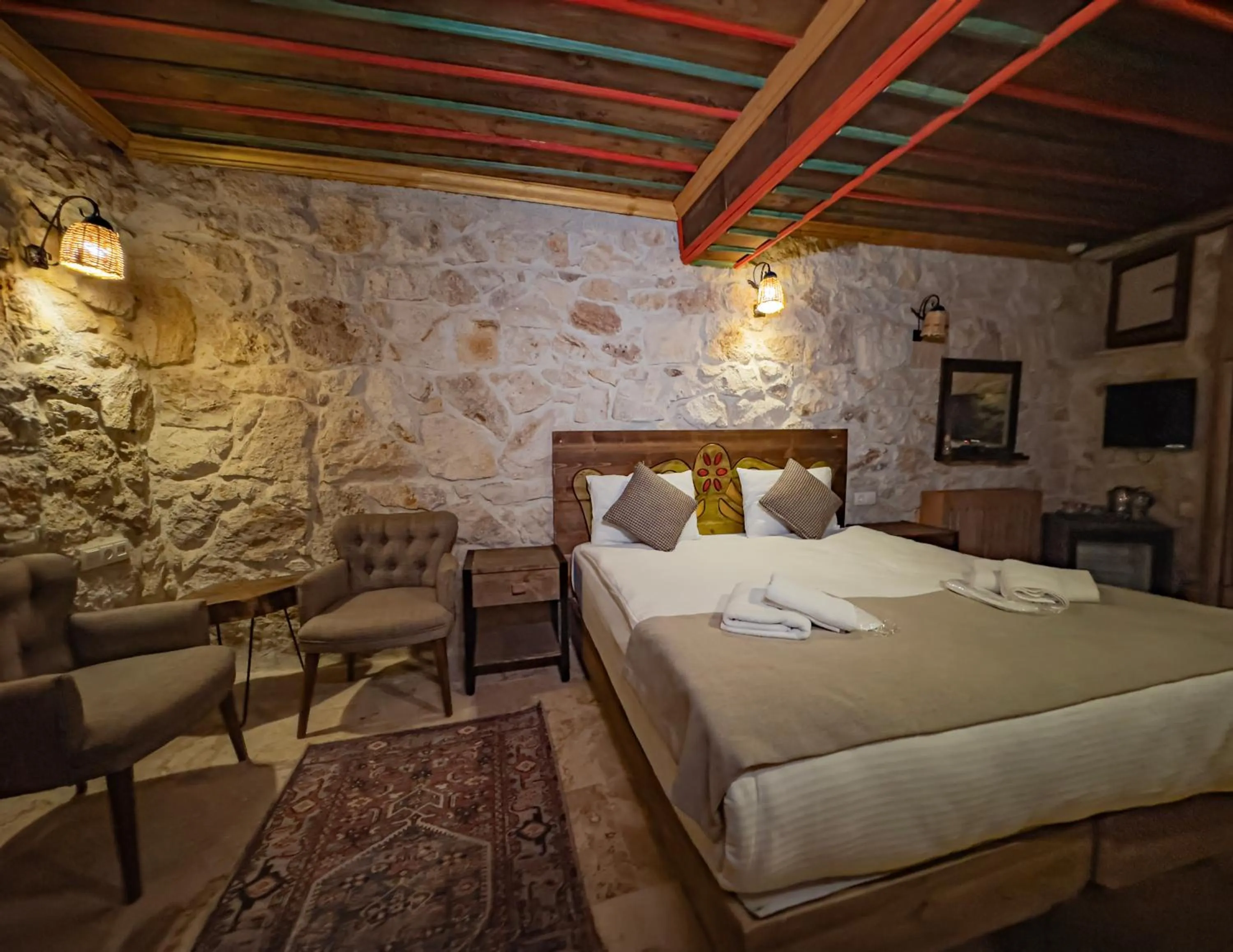 Seating area, Bed in Casa Di Cappadocia