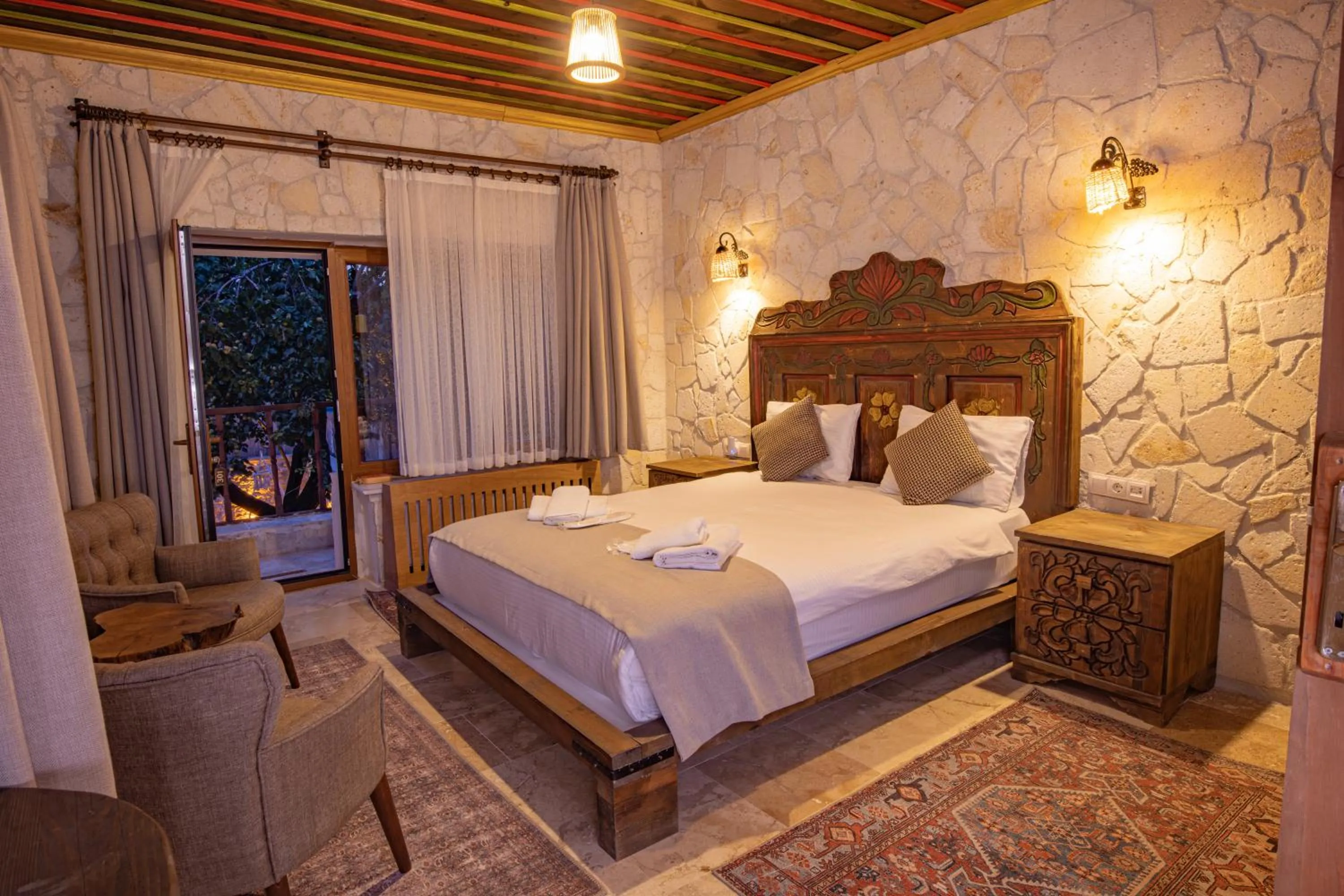 Seating area, Bed in Casa Di Cappadocia