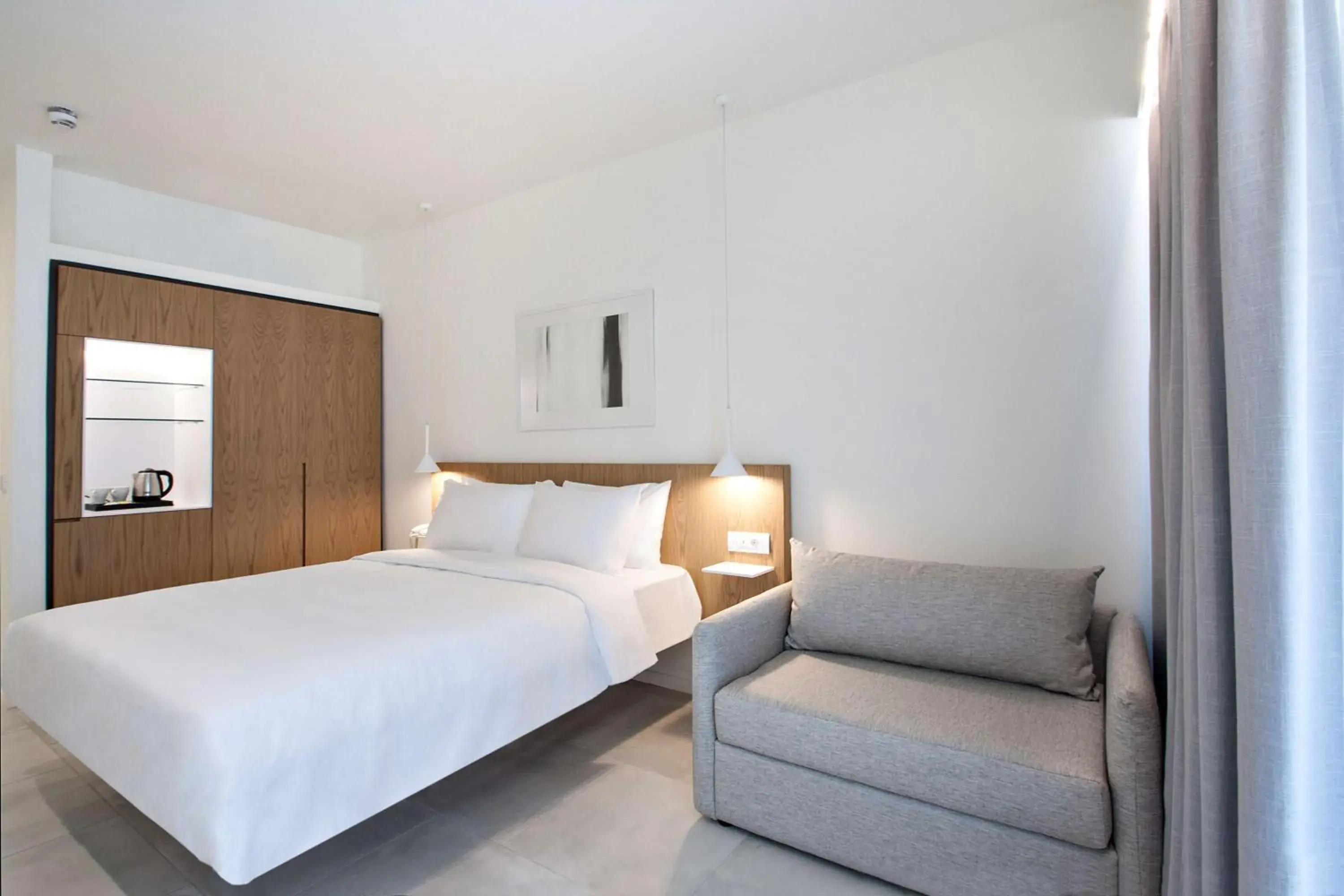 Bedroom, Bed in Radisson Resort Plaza Skiathos Bedroom, Bed in Radisson Resort Plaza Skiathos