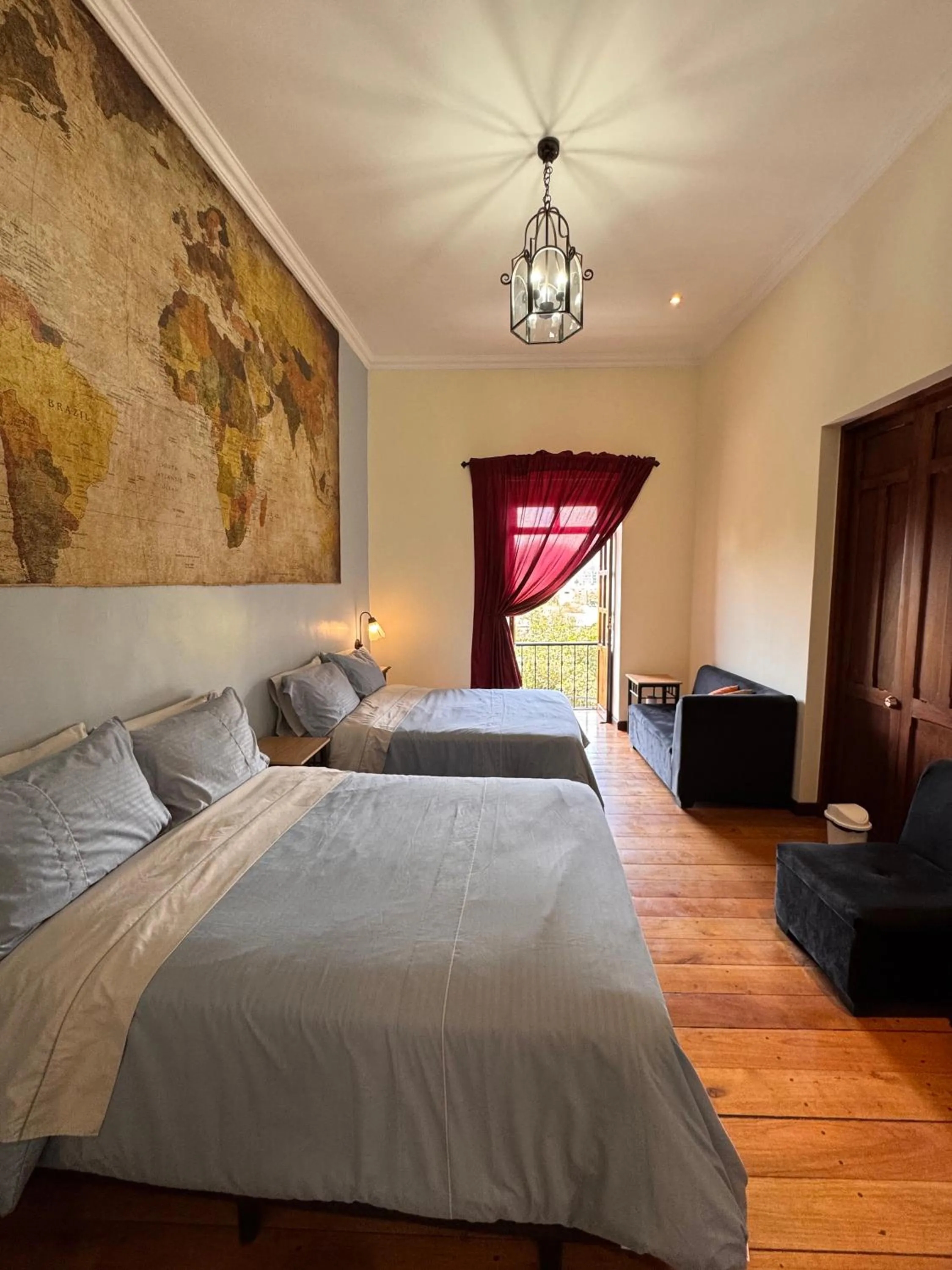 Deluxe Double Room with Balcony in Casa Hibiscus Boutique Hotel