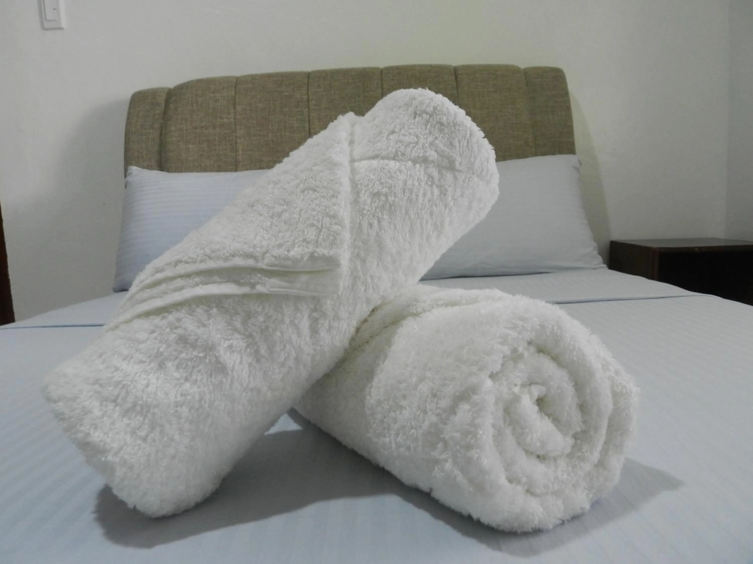 towels, Bed in The Victorian by Stevrena Accommodations