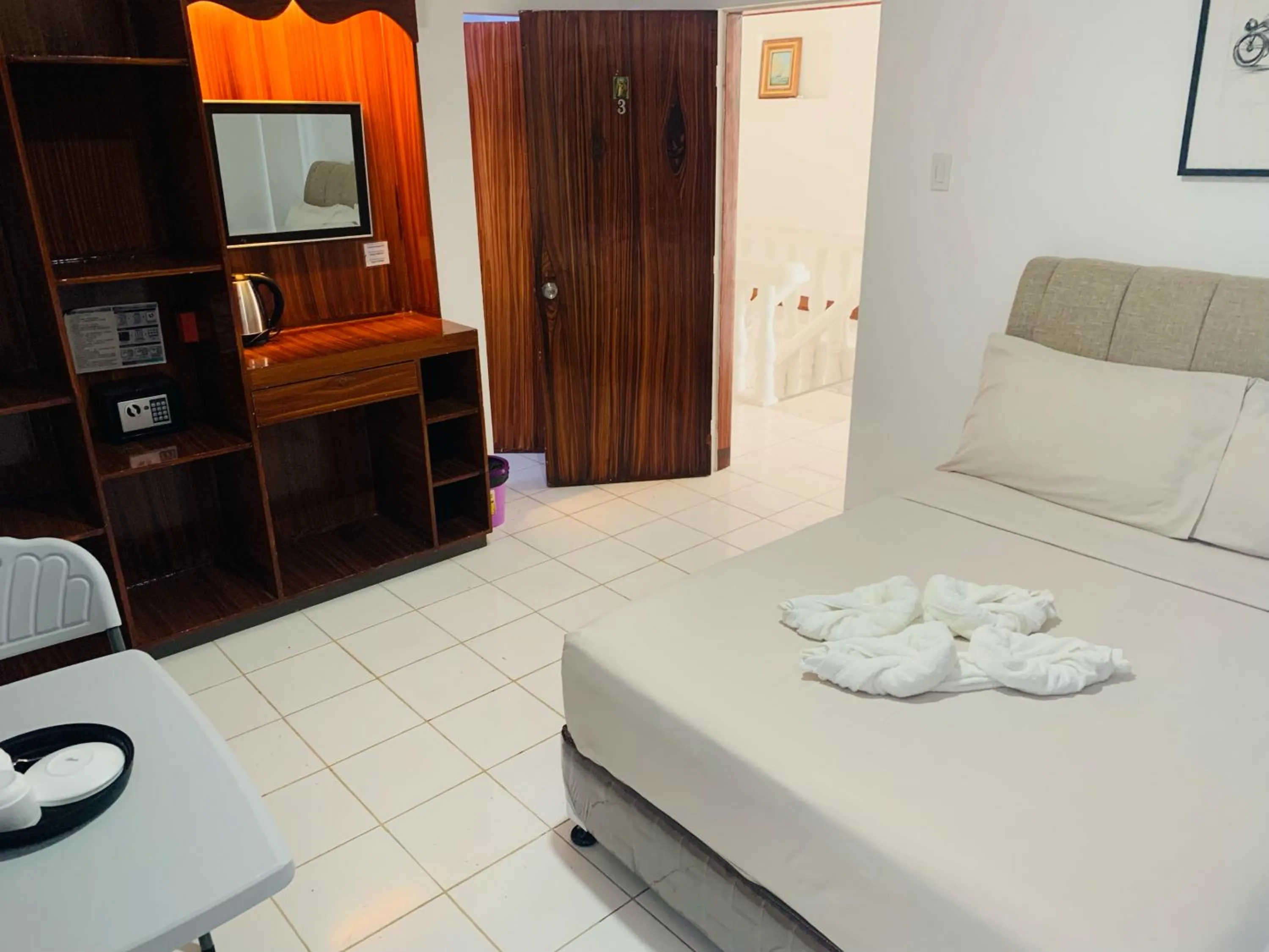 Bed in The Victorian by Stevrena Accommodations