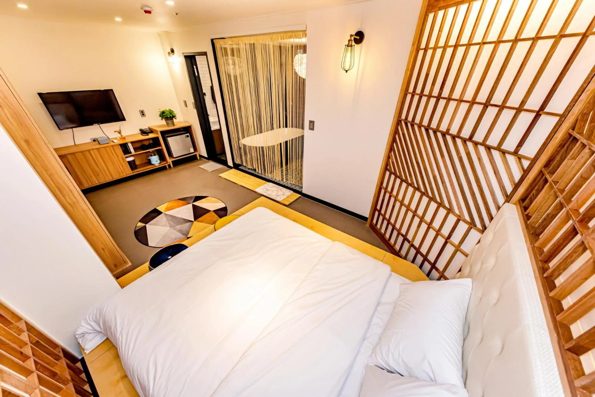 Bed in The Jade Hotel