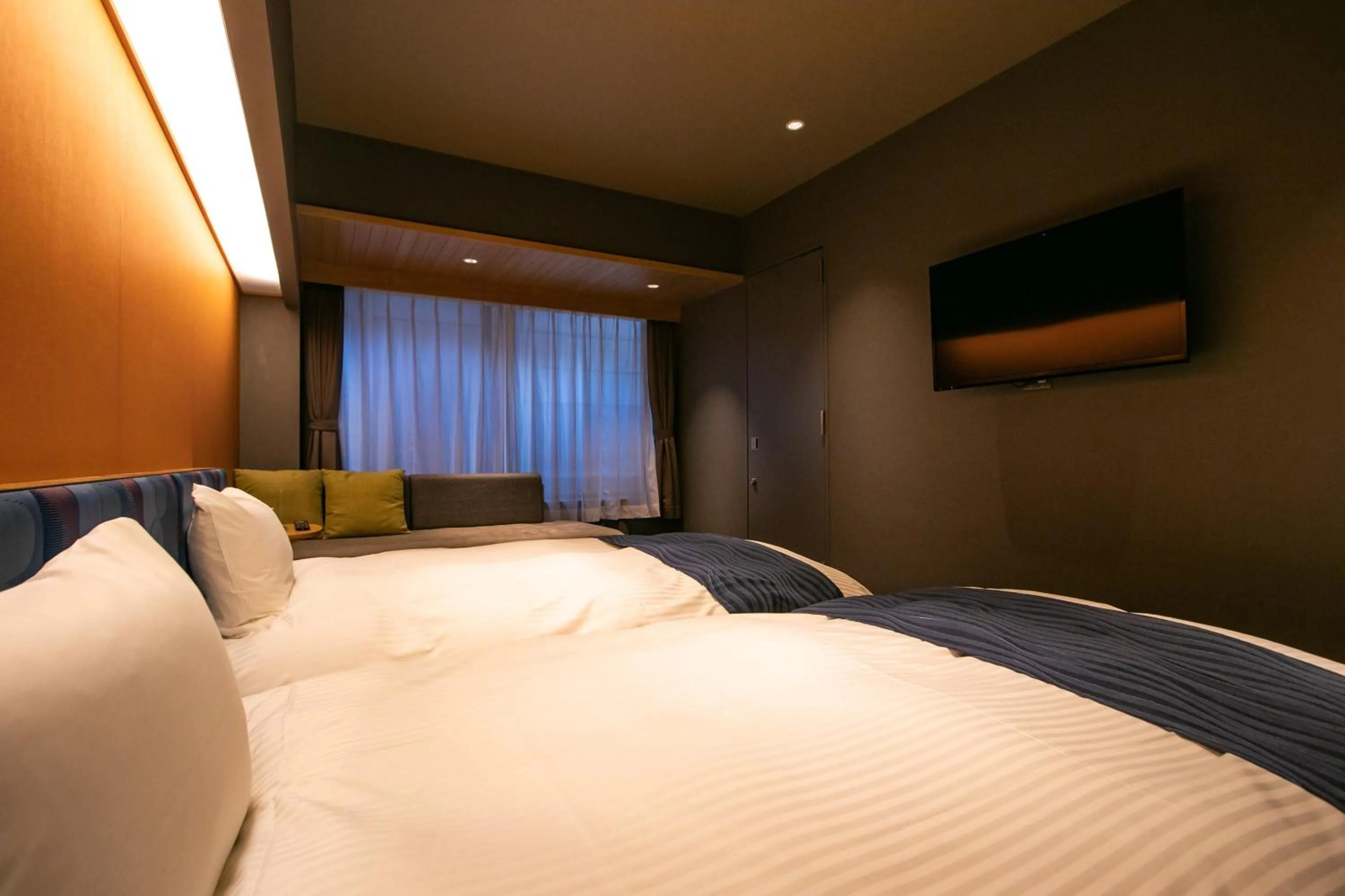 Bed in THE MACHIYA SHINSEN-EN