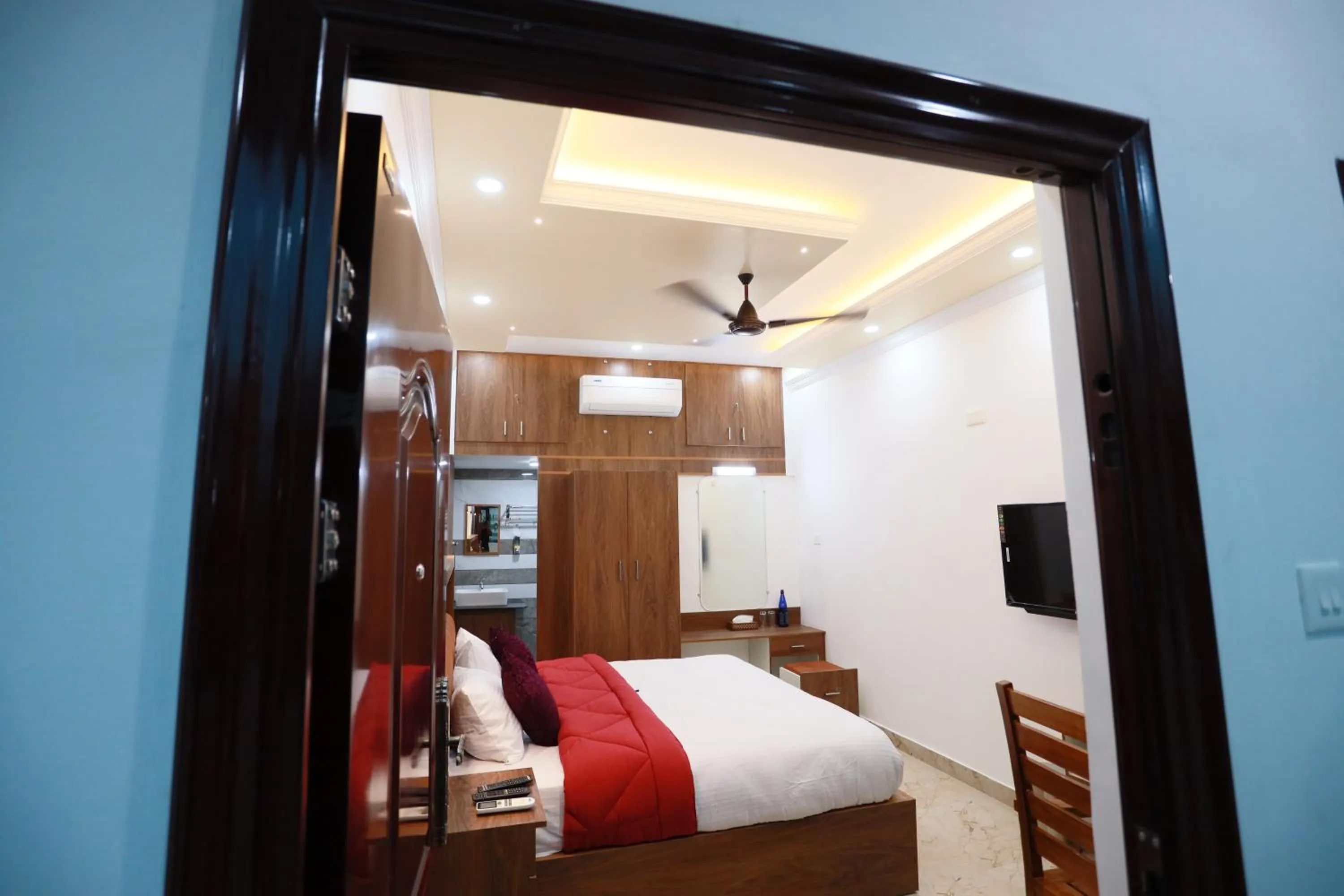 Photo of the whole room, Bed in Kausthubhom Residency