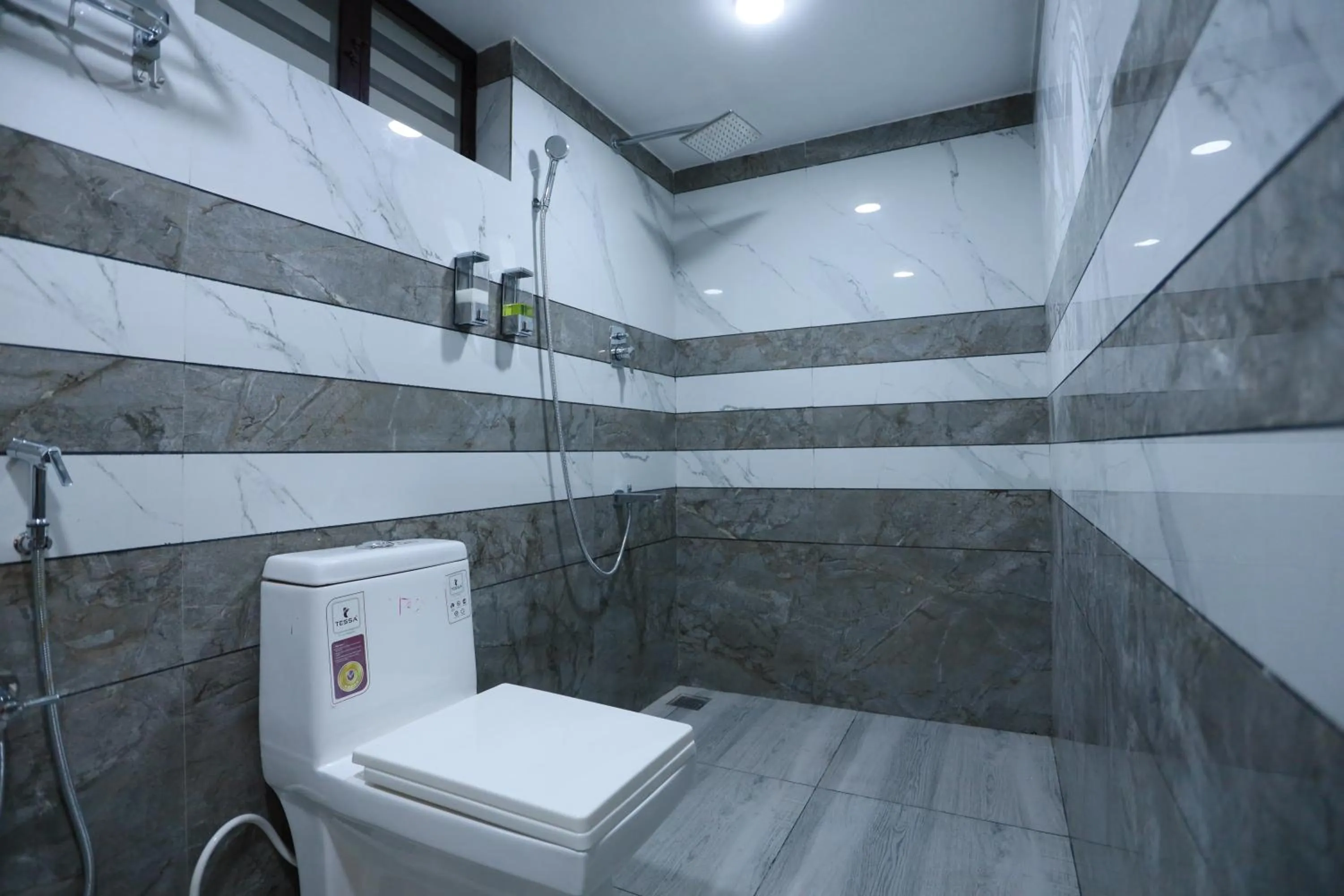Bathroom in Kausthubhom Residency