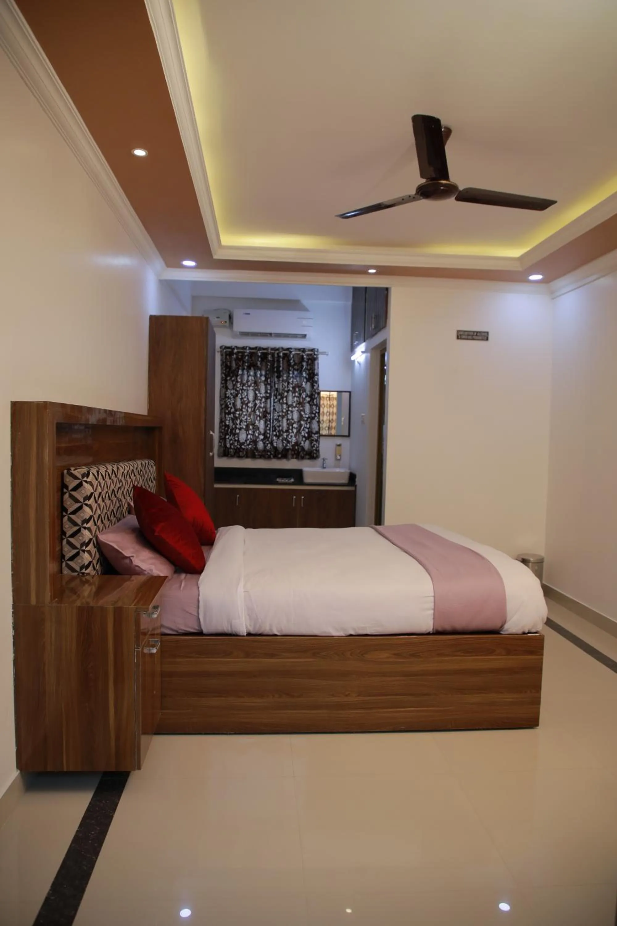 Photo of the whole room, Bed in Kausthubhom Residency