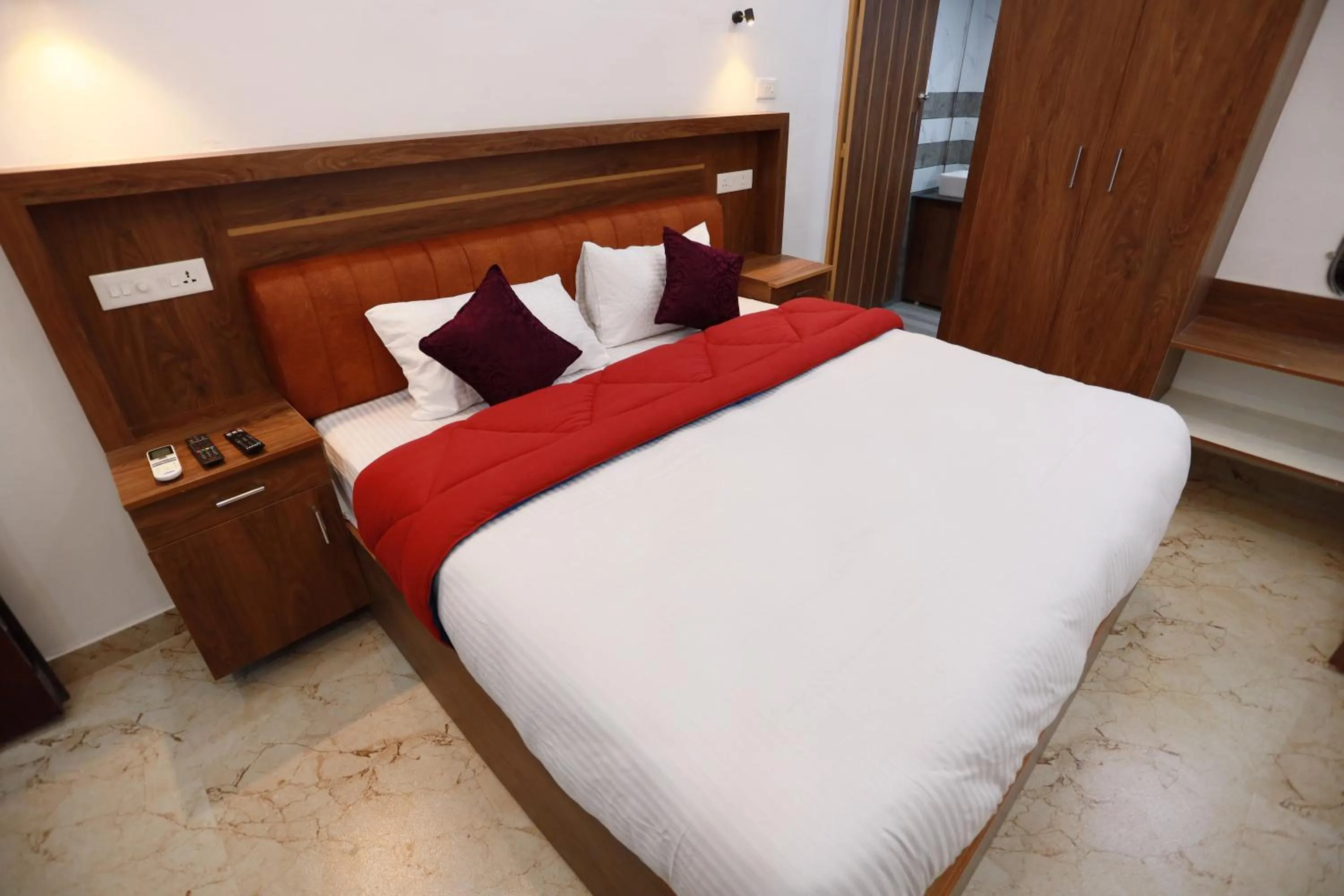 Bedroom, Bed in Kausthubhom Residency