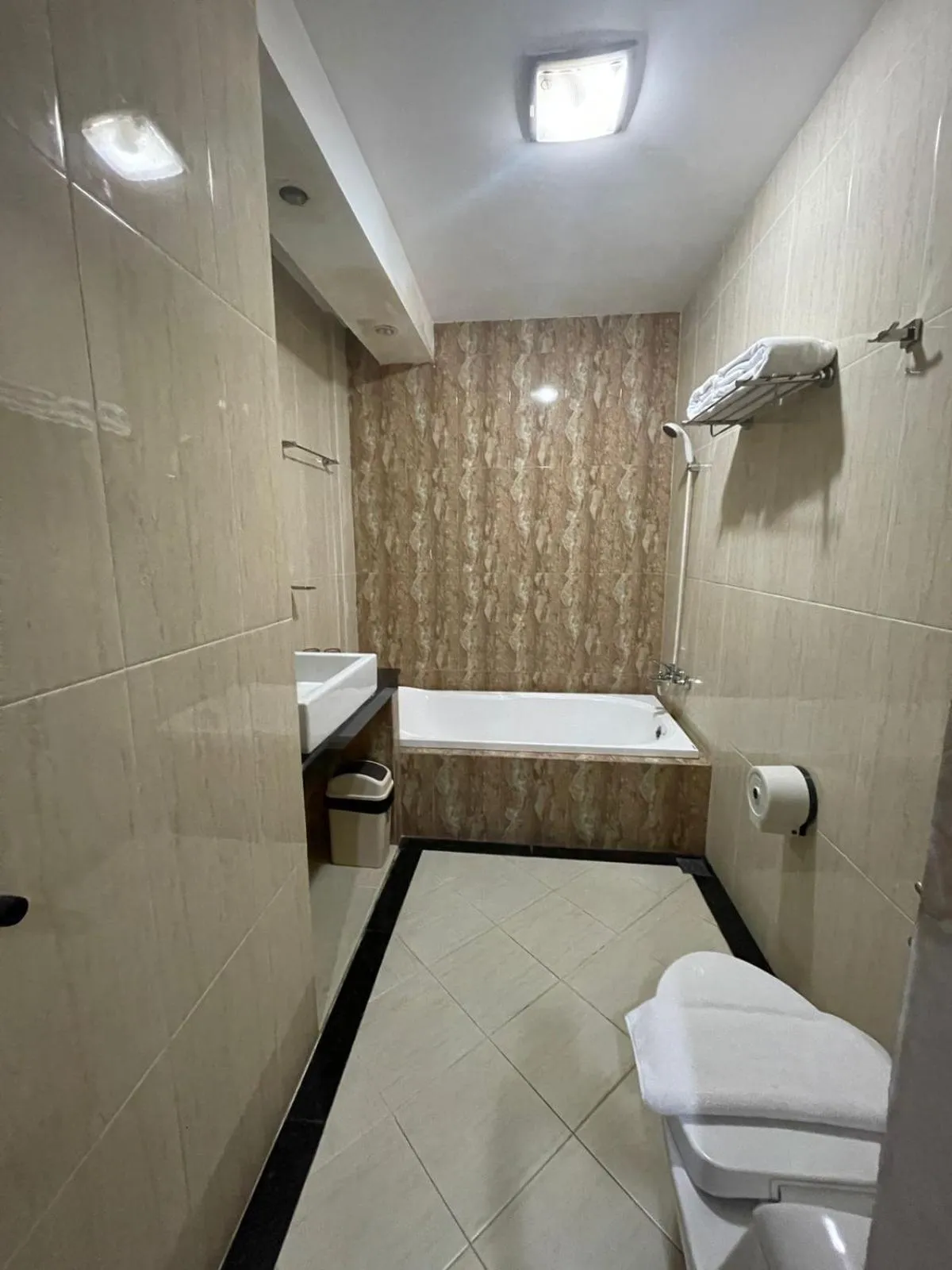 Bed in Grand Buana Lestari Hotel