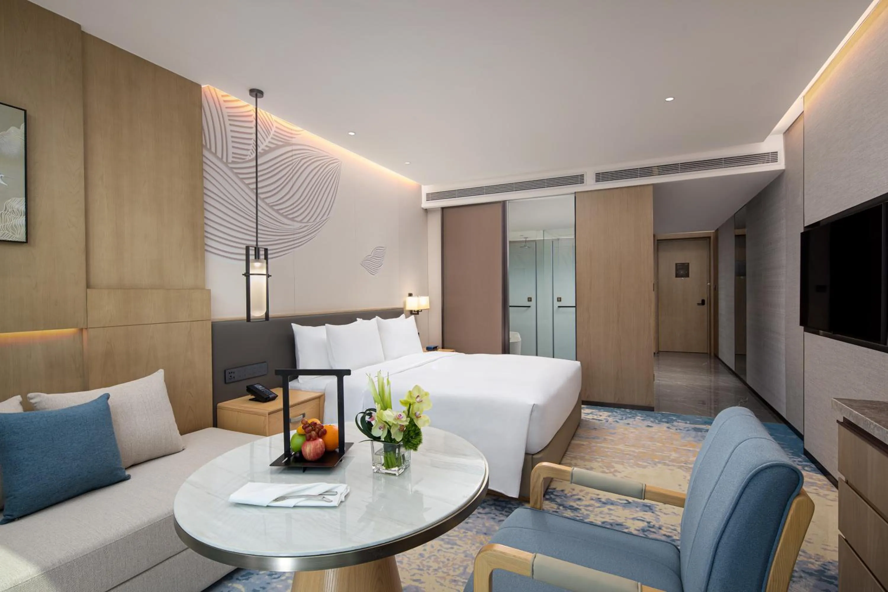 Bed in Wyndham Guangzhou Baiyun Mountain