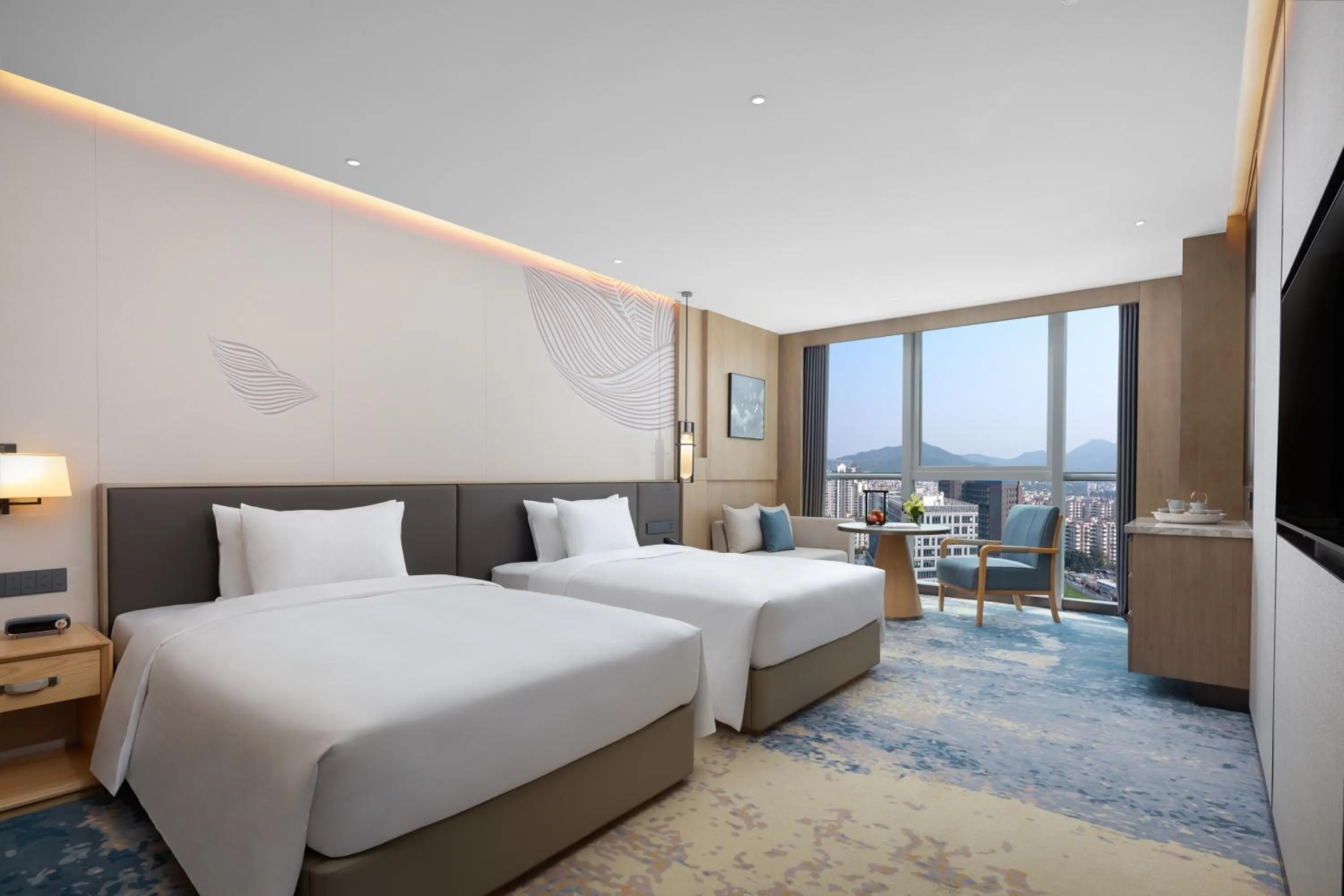 Bed in Wyndham Guangzhou Baiyun Mountain