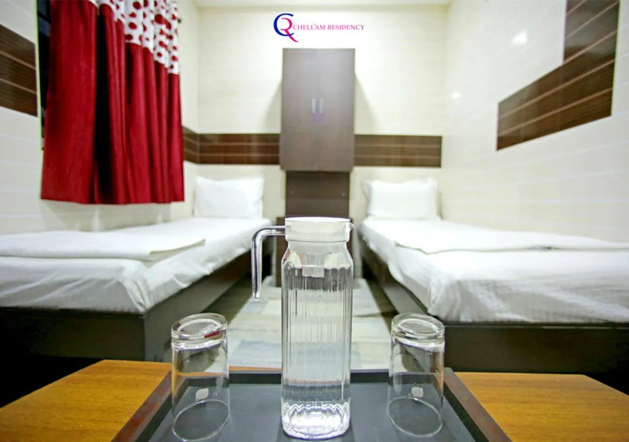 Photo of the whole room, Bed in Chellam Residency