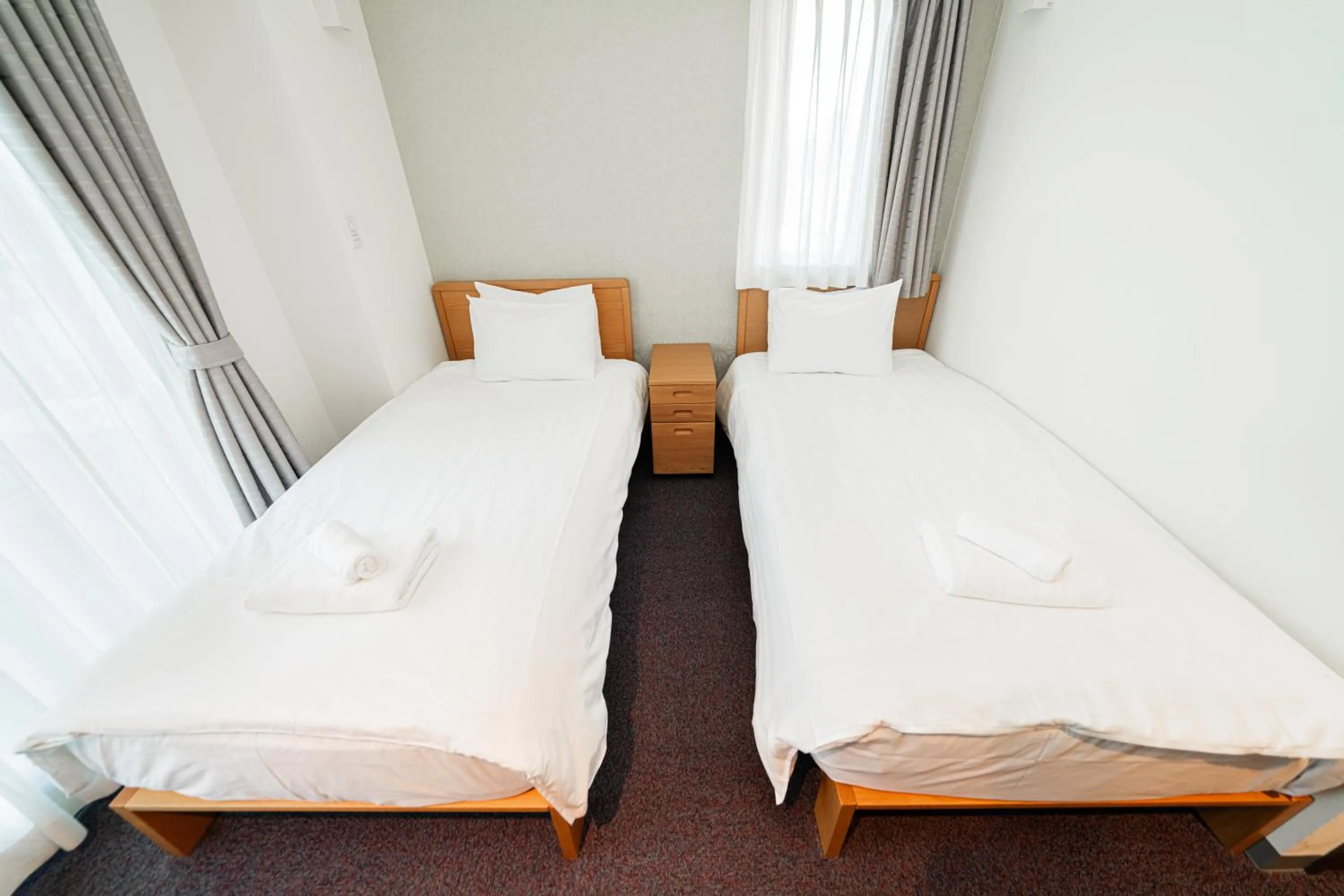 Bed in Serorin Light Hotel Tokyo