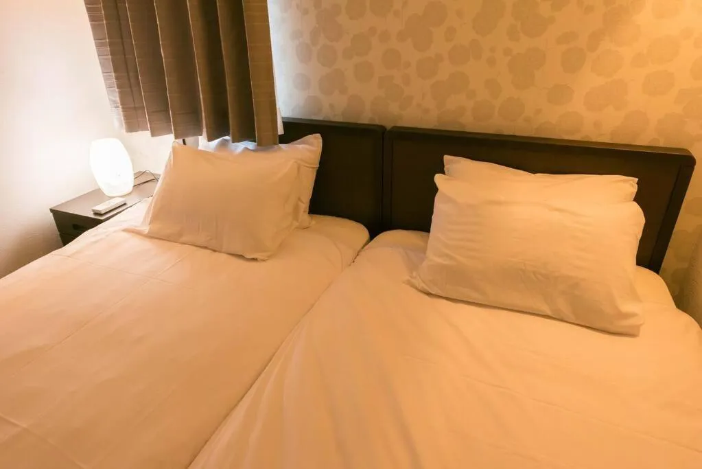 Bed in Serorin Light Hotel Tokyo