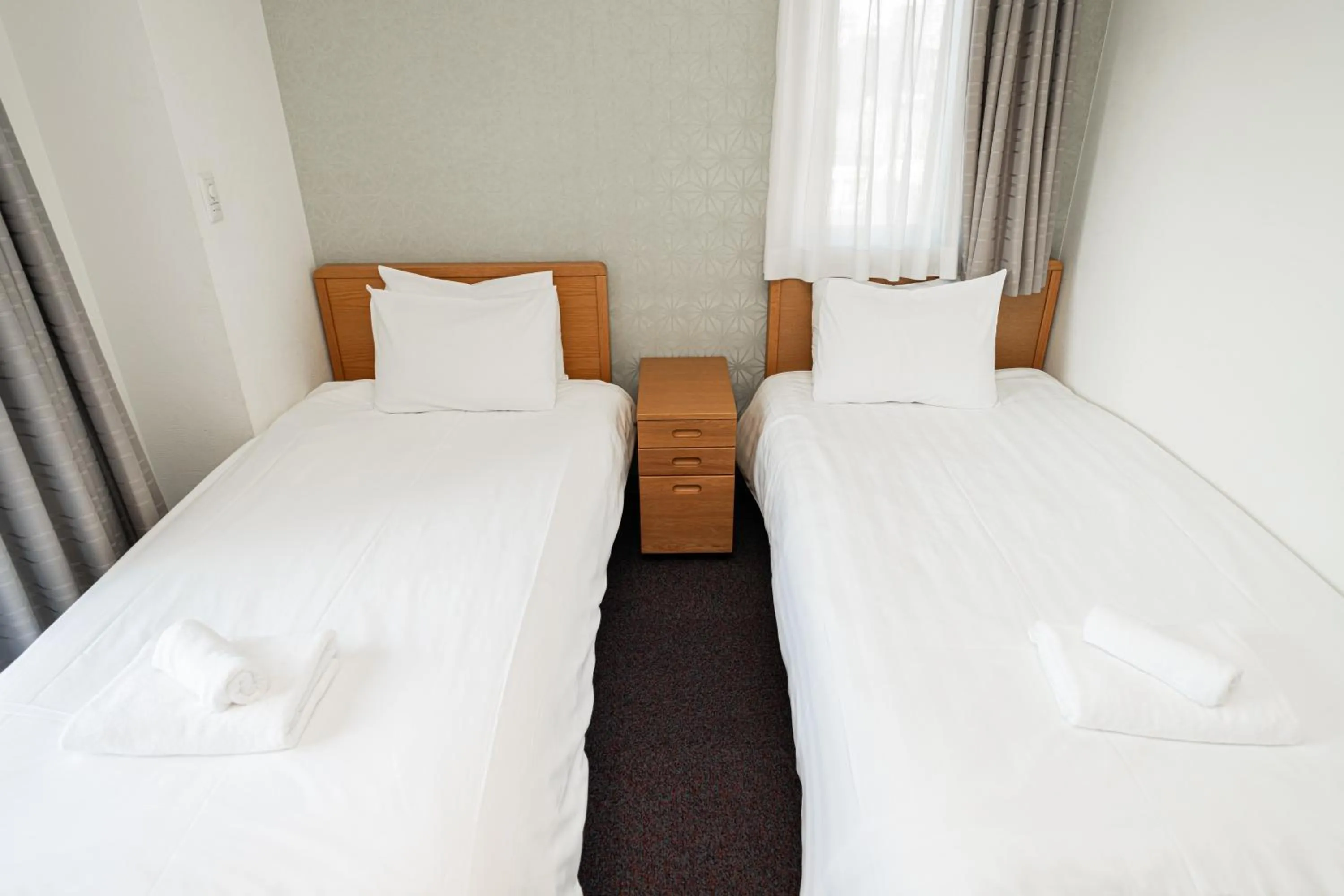 Bed in Serorin Light Hotel Tokyo