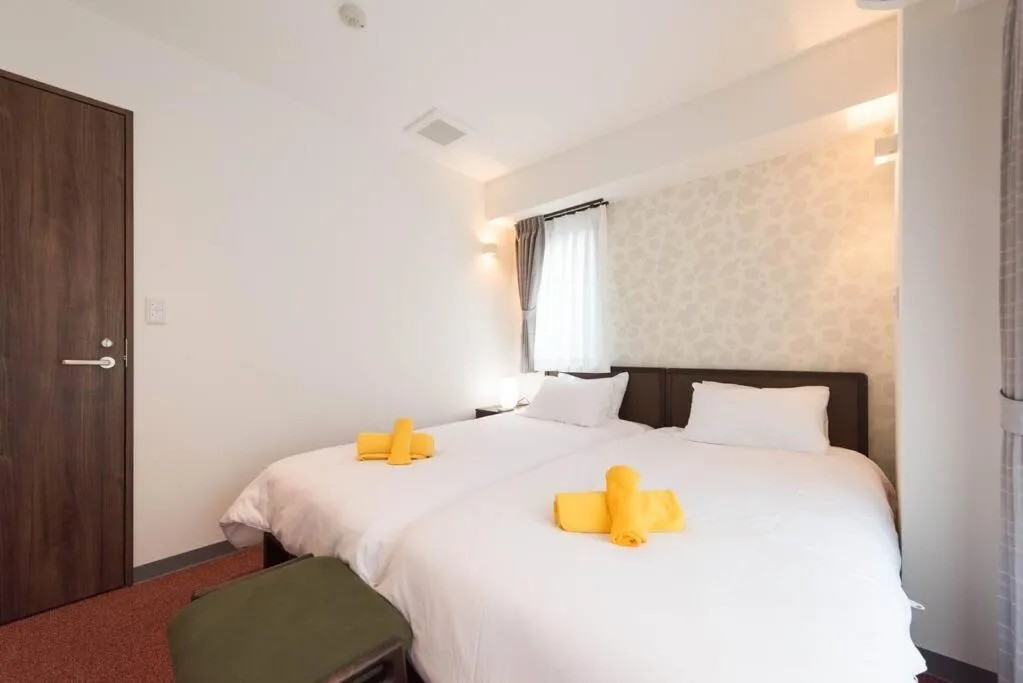 Bed in Serorin Light Hotel Tokyo