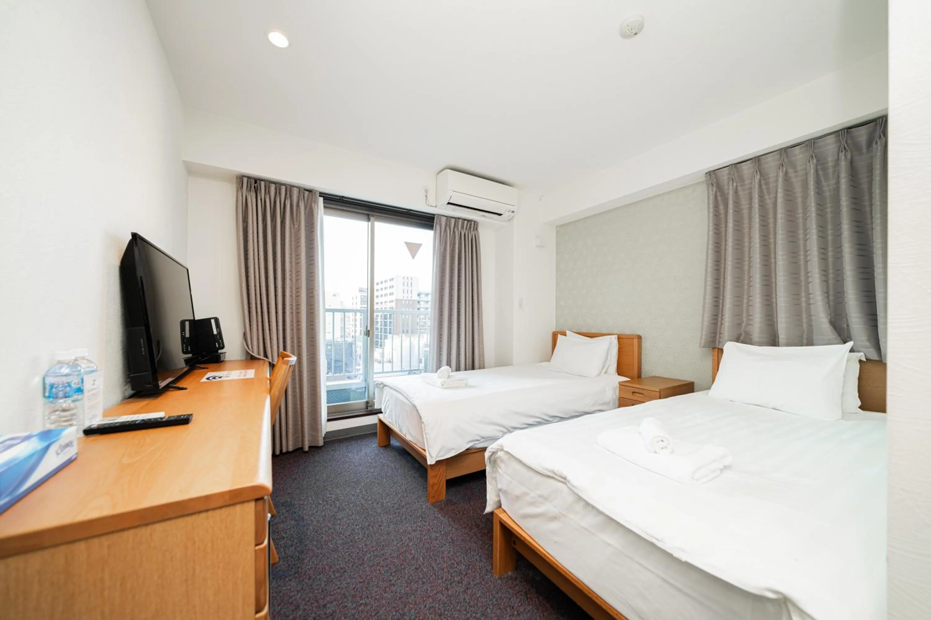 Bed in Serorin Light Hotel Tokyo