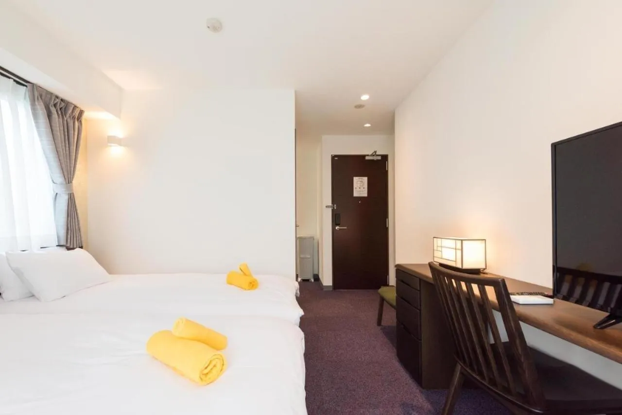 Bed in Serorin Light Hotel Tokyo