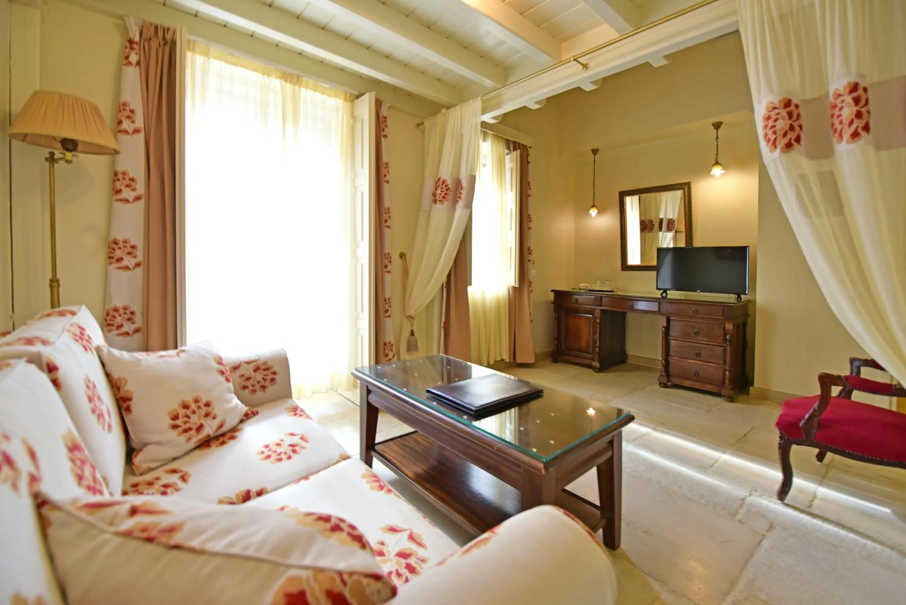 Seating area, Bed in Angelica Traditional Boutique Hotel