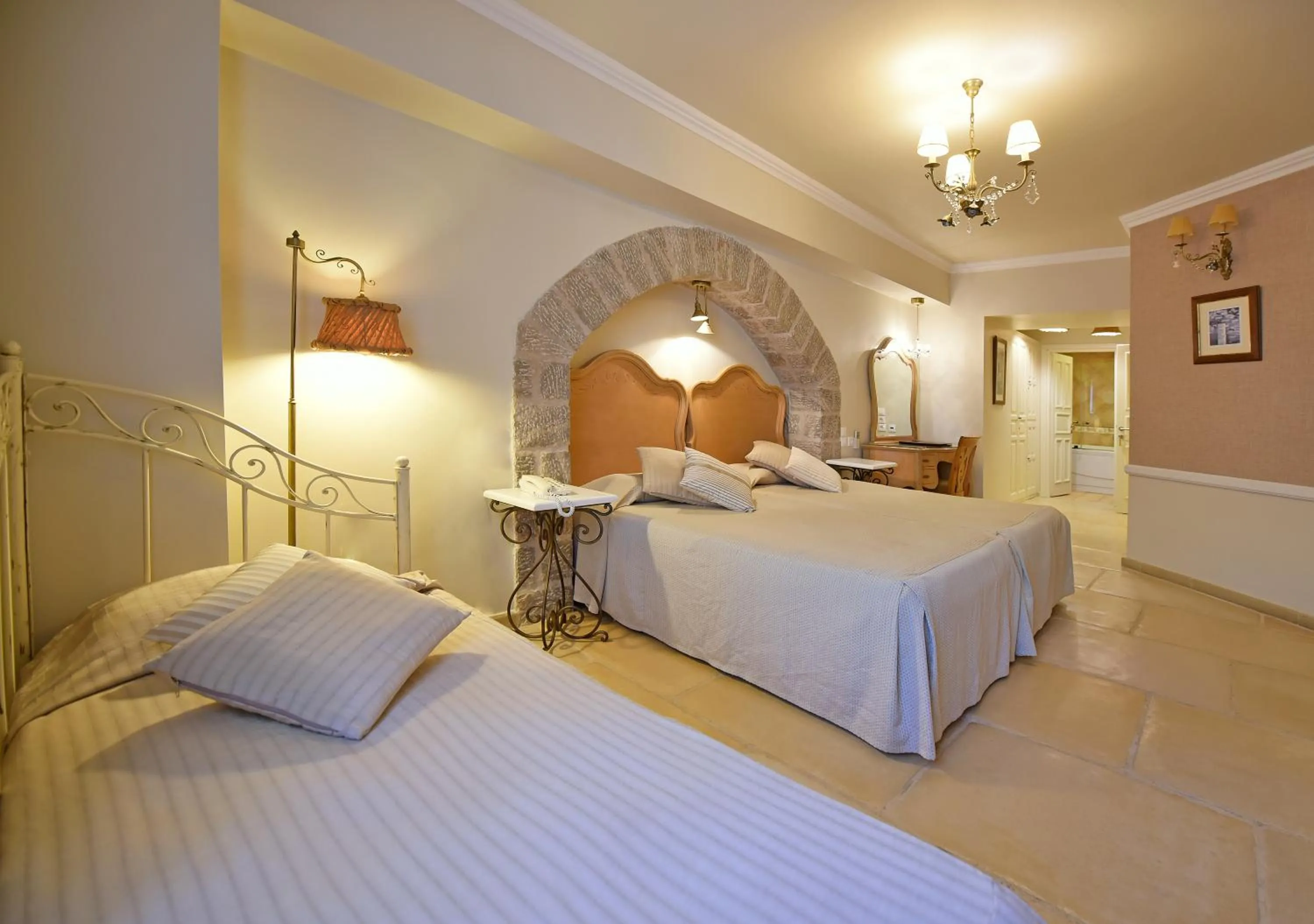 Bed in Angelica Traditional Boutique Hotel