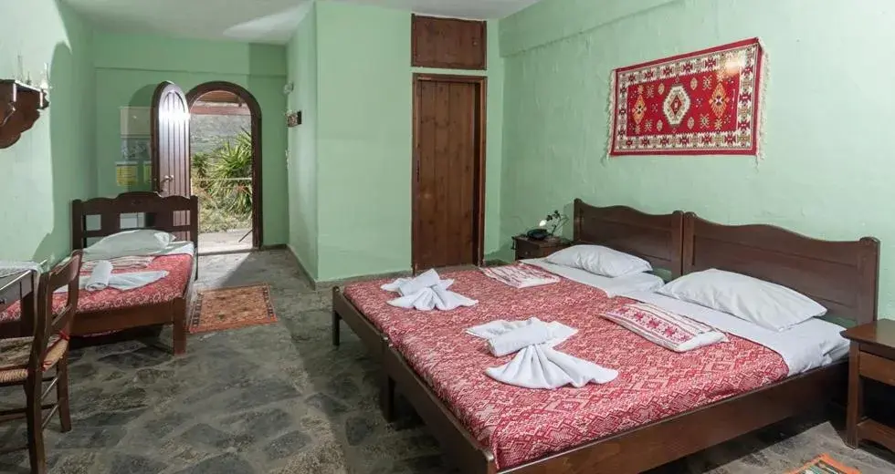 Bed in Arolithos Traditional Village Hotel Bed in Arolithos Traditional Village Hotel